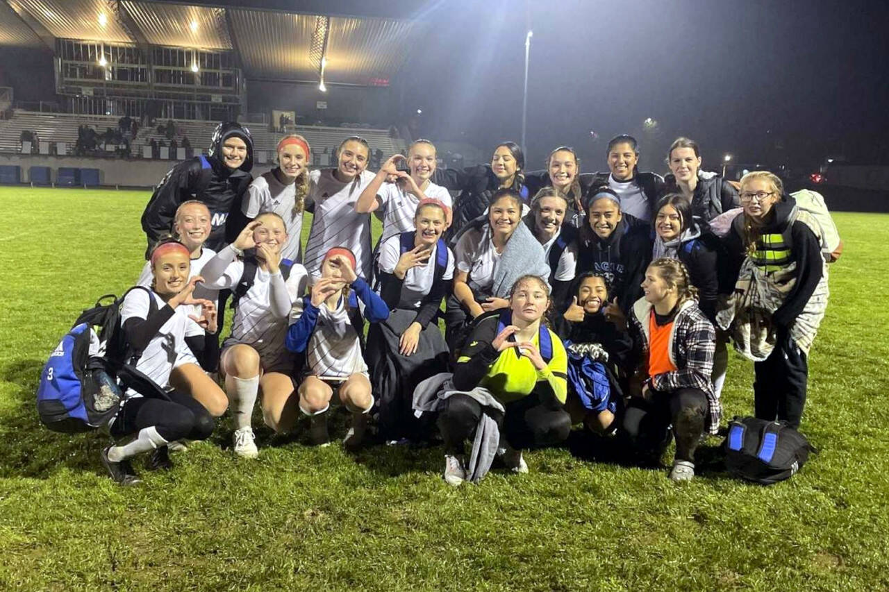 SUBMITTED PHOTO The Elma Eagles hold up an “S” for state after a 3-2 upset victory over La Center in a 1A District 4 Tournament semifinal game on Thursday, Nov. 3, 2022 at La Center High School. With the victory, the Eagles earn a berth in the district-title game and state playoffs.