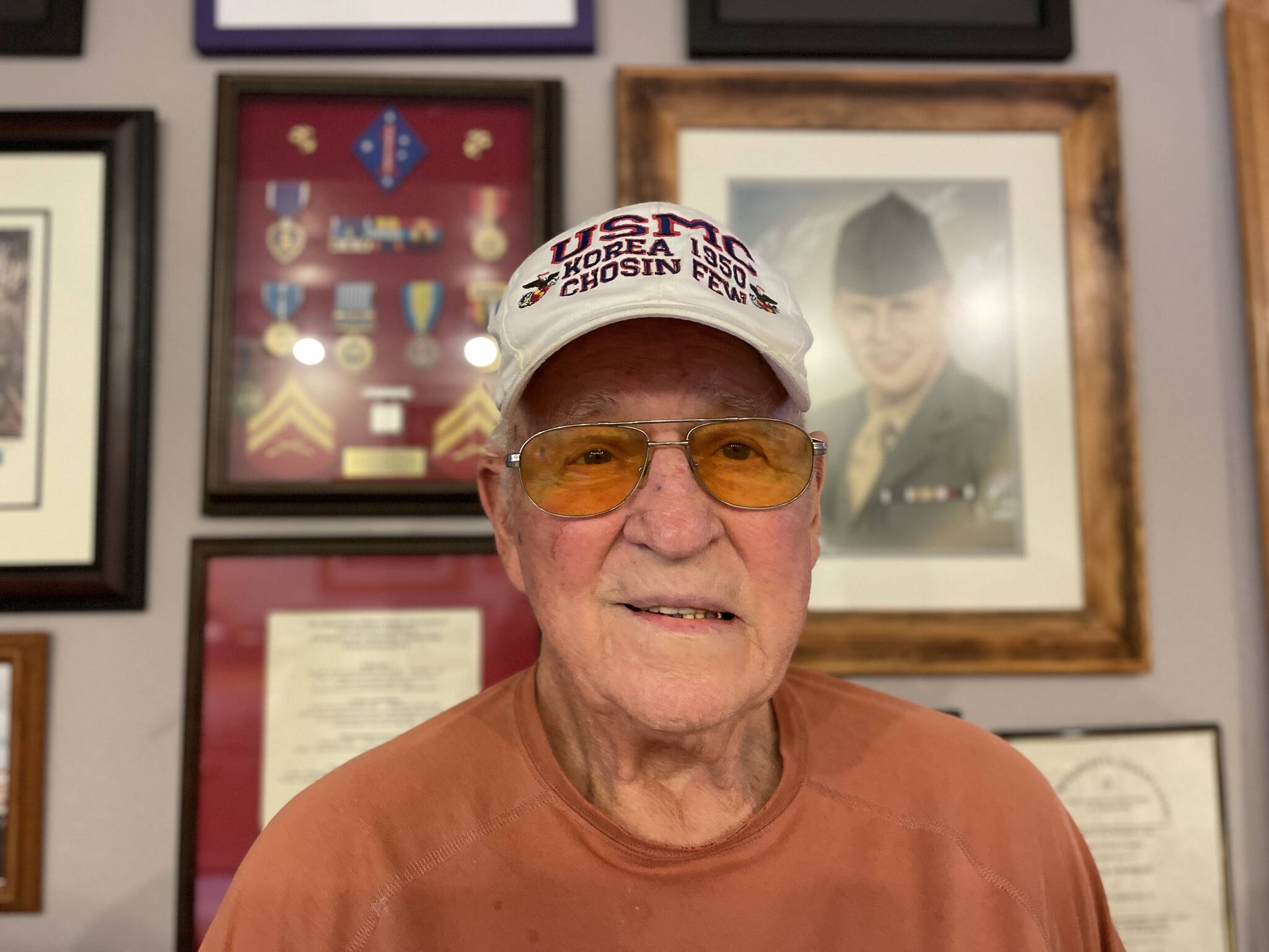 Irv Stephens stands in front of his decorations, earned during the Battle of the Chosin Reservoir in the Korean War, one of the most brutal battles of the conflict. (Michael S. Lockett / The Daily World)