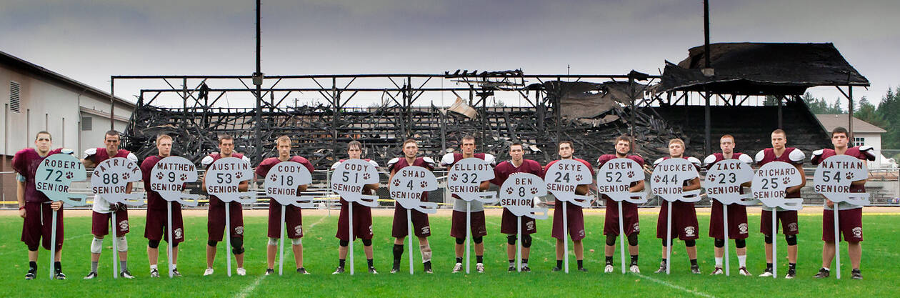 Photograph courtesy Shawn Donnelly 
The Montesano football team stands in front of a scorched stadium in 2012.