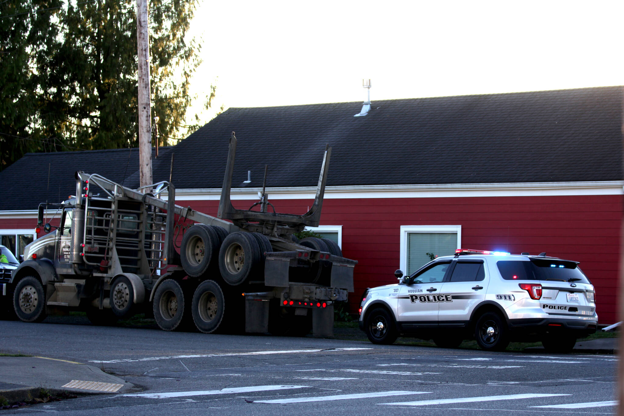 A log truck struck two students in a crosswalk in Hoquiam on Nov. 8, noncritically injuring them. (Michael S. Lockett / The Daily World)
