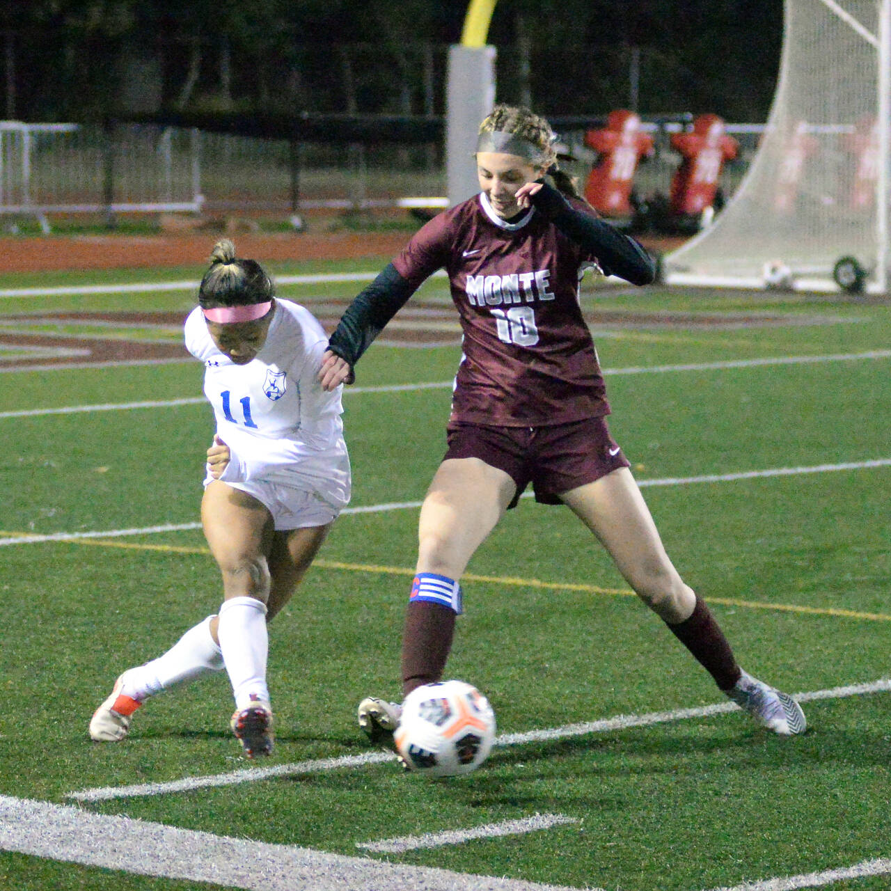 RYAN SPARKS / THE DAILY WORLD 
Montesano junior forward Mikayla Stanfield (10) and La Salle defender Cin Par compete for possession during the Bulldogs’ 3-1 victory in a 1A State first-round playoff game on Wednesday at Jack Rottle Field in Montesano.