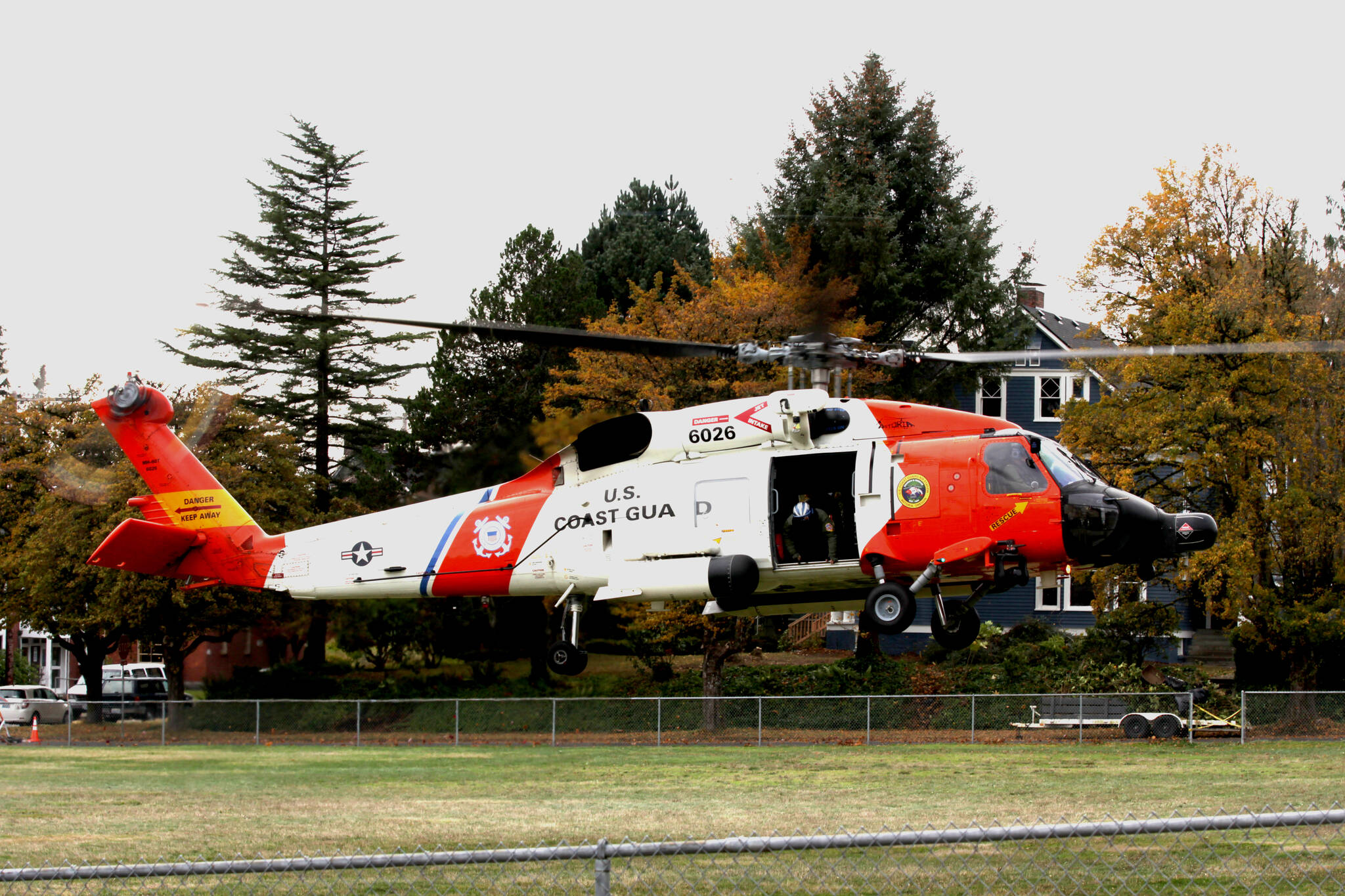 Michael S. Lockett / The Daily World 
An MH-60 Jayhawk from Coast Guard Air Station Astoria that visited Aberdeen as part of a Veterans Day ceremony lands in a field near St. Mary School on Nov. 10.