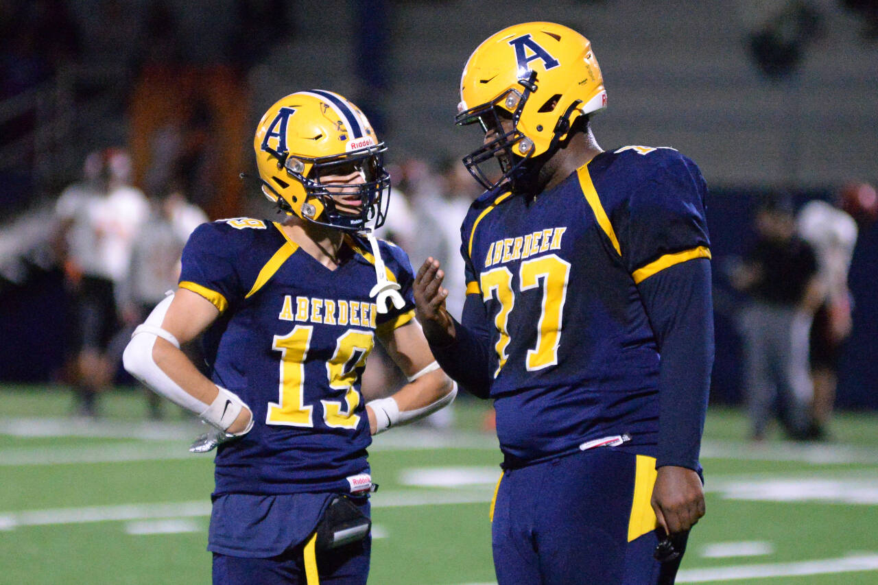 DAILY WORLD FILE PHOTO
 Aberdeen’s JaBron Brooks (77) and Aidan Watkins (19) were both named to the 2A Evergreen Conference All-League Football Team this week. Brooks was named First Team for both offensive and defensive lines while Watkins was named a Second Team running back.