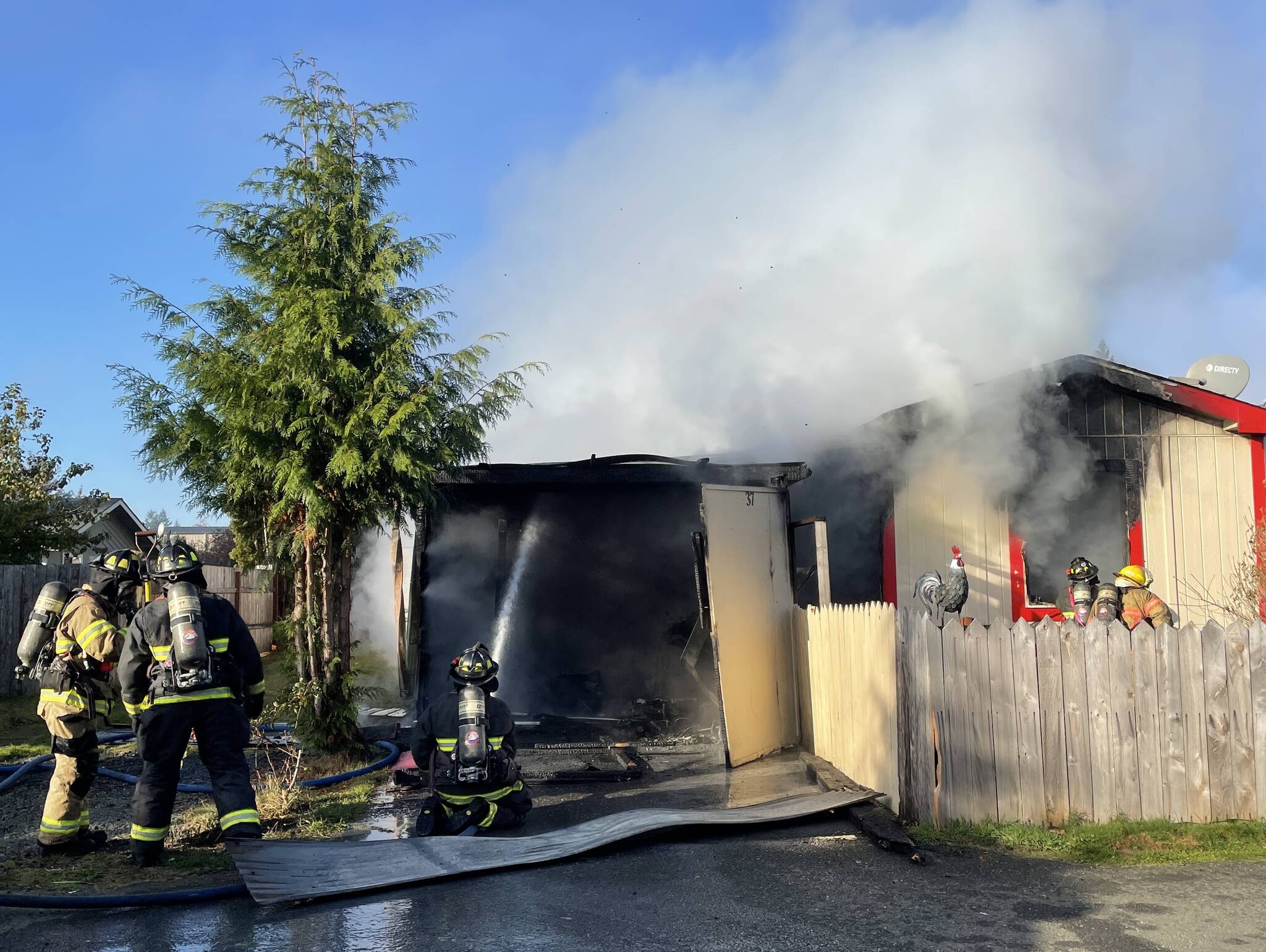 Michael S. Lockett / The Daily World
East Grays Harbor Fire and Rescue and the Montesano Fire Department responded to a trailer fire early on Tuesday, Nov. 15.