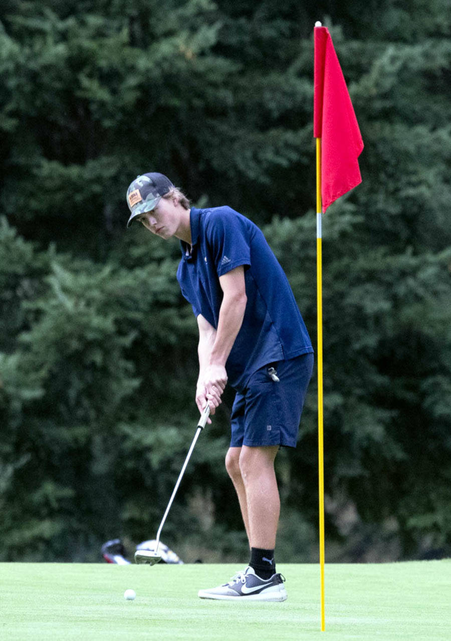 PHOTO BY PATTI REYNVAAN
Aberdeen’s Charlie Ancich tees off during a match against Hoquiam earlier this season at the Grays Harbor Country Club in Aberdeen. Ancich was one of three Bobcats golfers named to the 2A Evergreen All-Conference Team for the 2022 season.