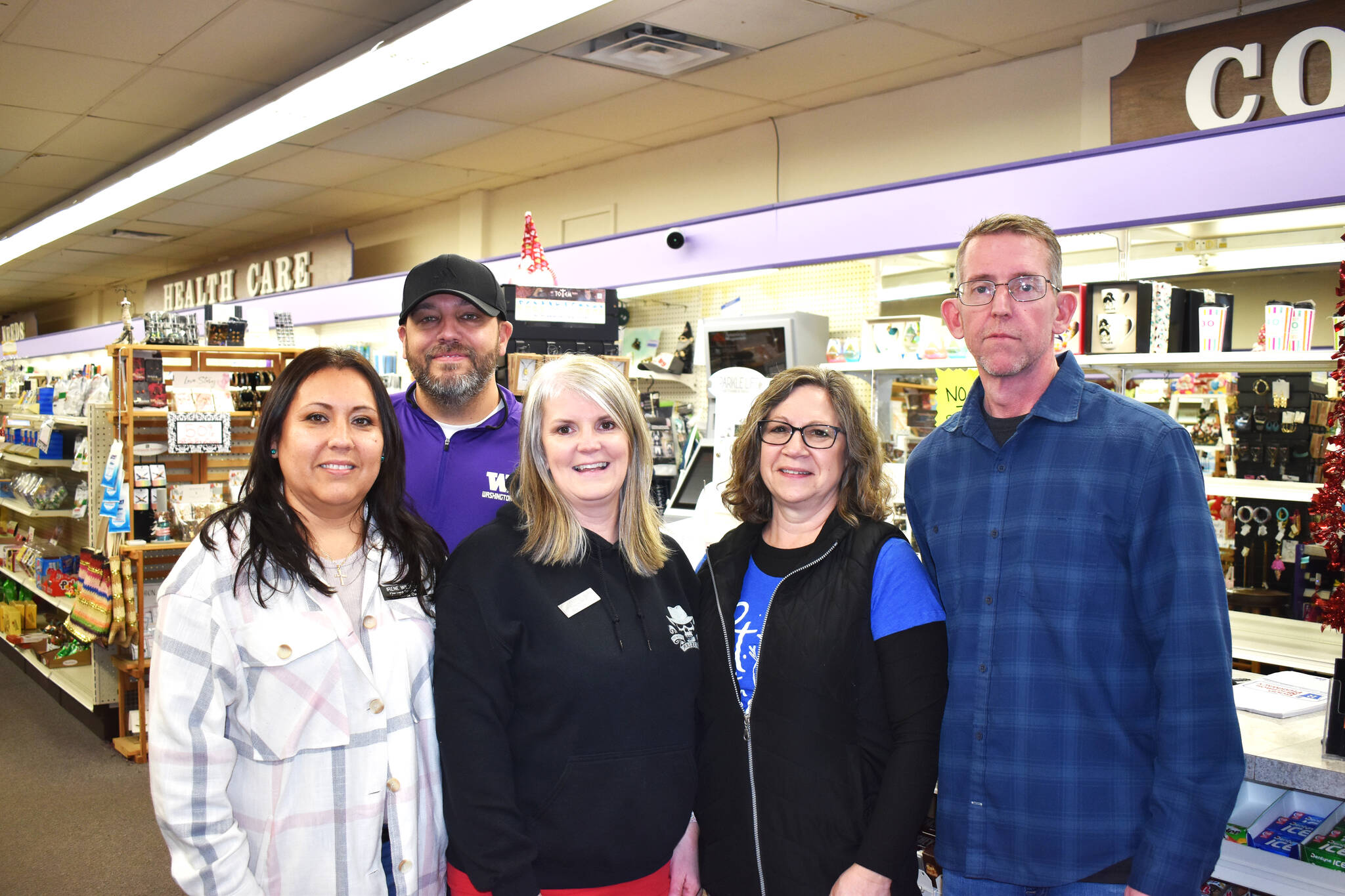 Matthew N. Wells / The Daily World
Patrick ODonnell, owner of City Center Drug Co.,  108 E. Wishkah St., in Aberdeen  stands on the right with his staff inside the pharmacy. The store will be in operation through end of business on Dec. 27. Then, starting on Dec. 28, the prescription records will transfer to Rite Aid. People can either use Rite Aid, or they can transfer to another pharmacy if they so choose. ODonnell, who has owned the pharmacy since the mid-2000s, would rather keep the pharmacy open, but after trying to keep it open, he feels he has no other choice but to close it.