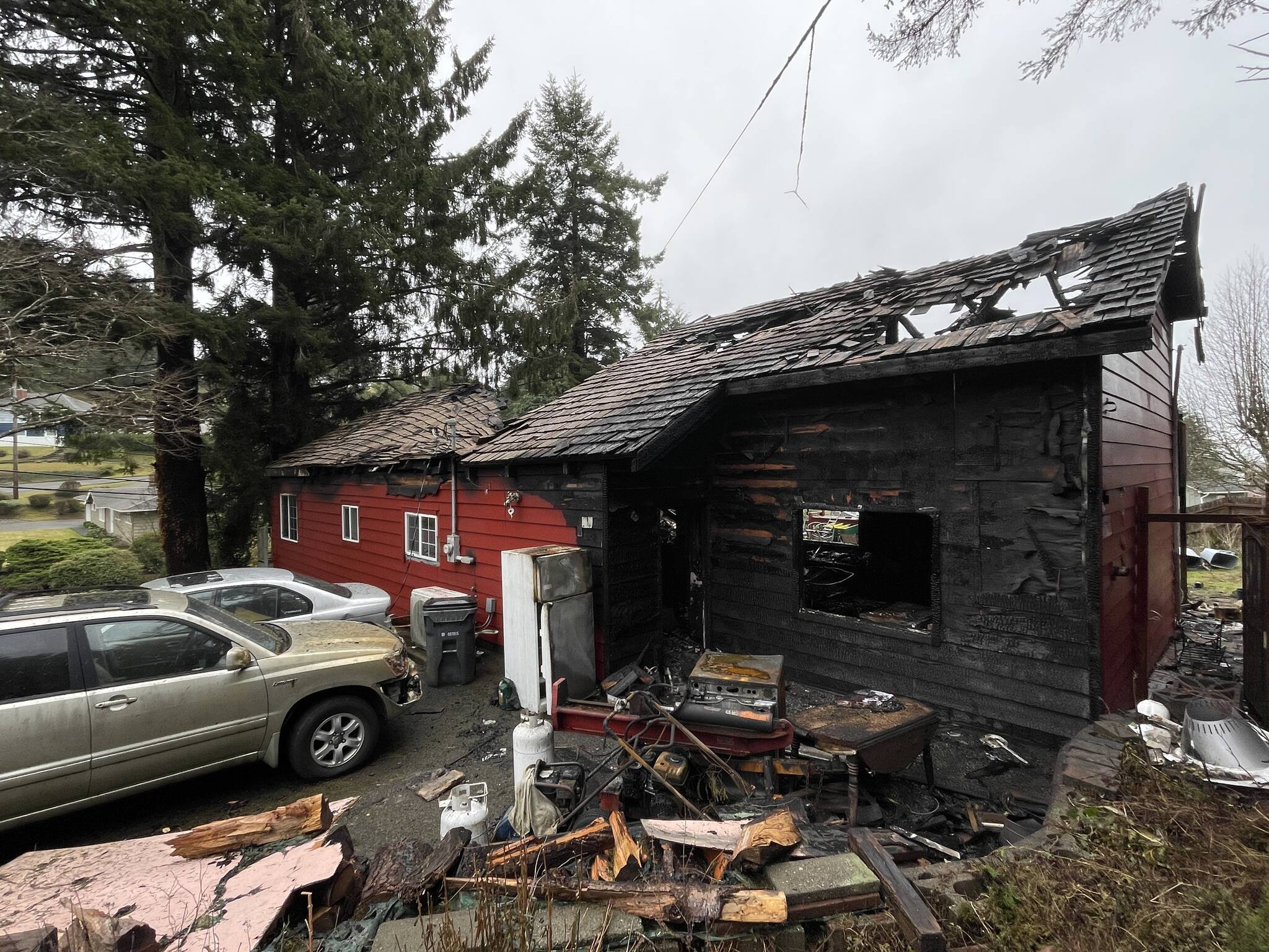 A fire that saw three different departments respond completely destroyed a Hoquiam residence over the holiday weekend. (Michael S. Lockett / The Daily World)