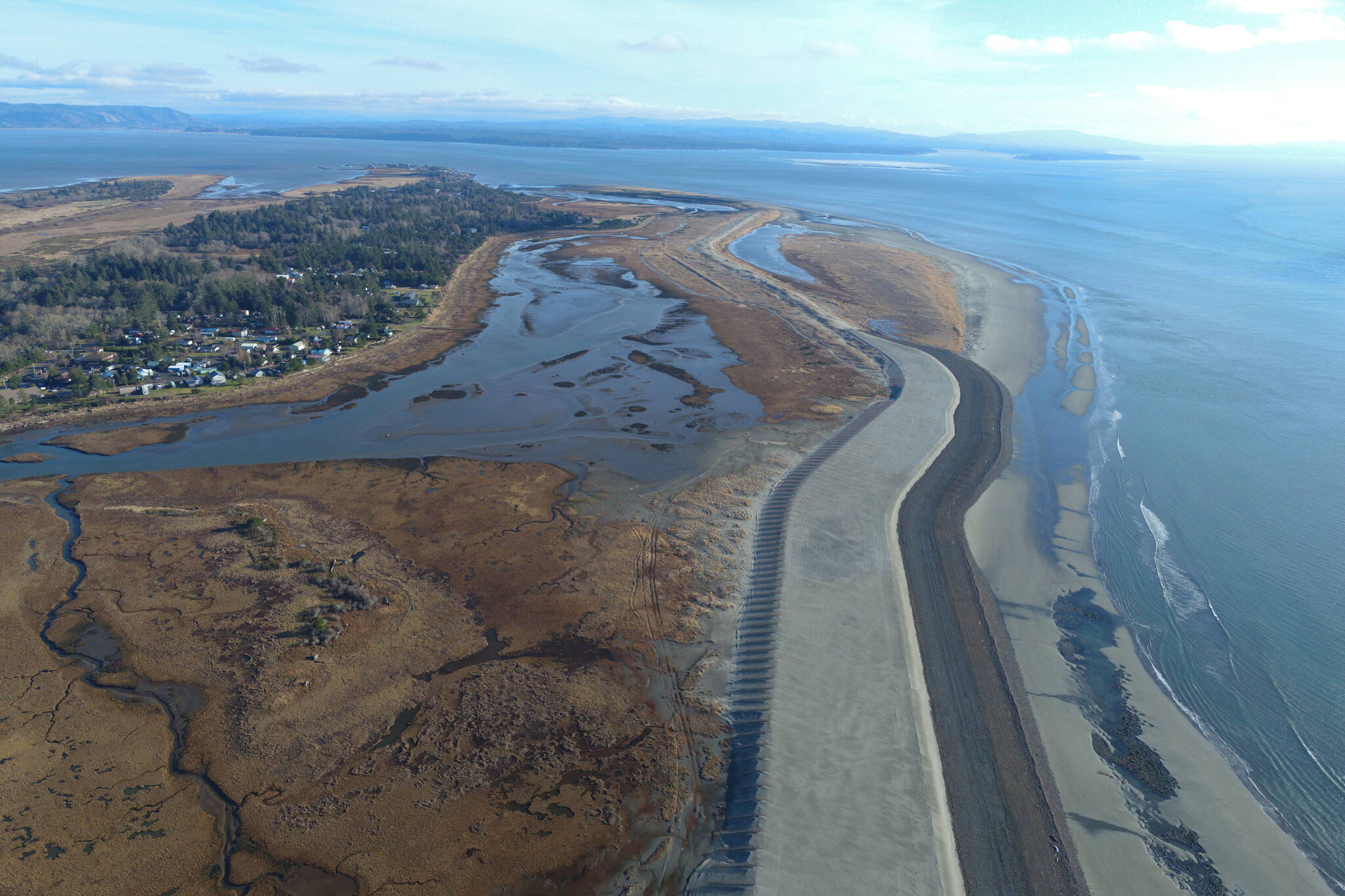 The reinforced storm barrier, the result of an emergency project overseen by the Army Corps of Engineers, will prevent winter storms from thrashing the coastal lowlands of the Shoalwater Bay Indian Tribe’s lands near Tokeland. (Courtesy photo / Shoalwater Bay Indian Tribe)