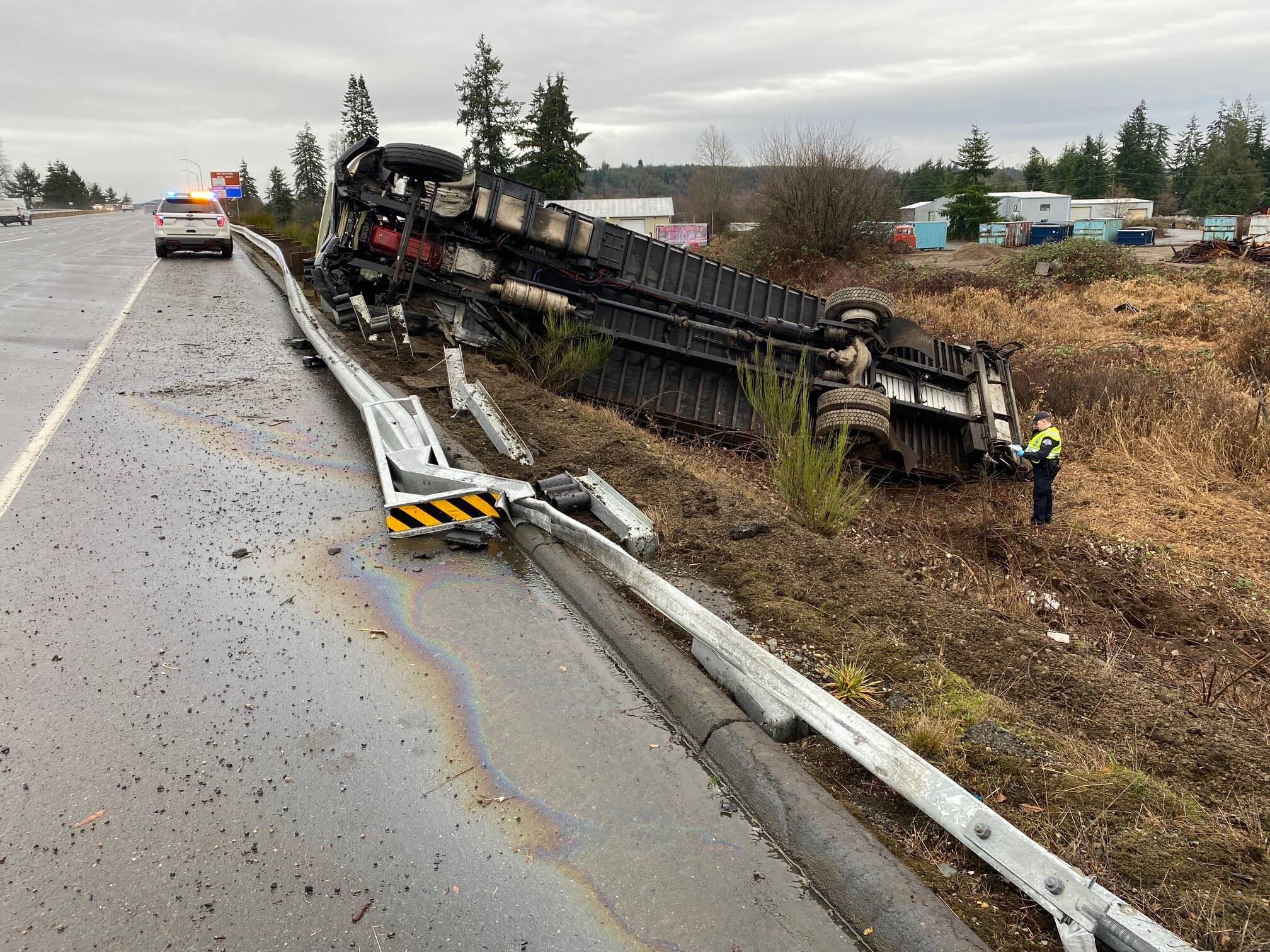 A 26-year-old man was arrested for driving under the influence after driving off the road in a 30-foot cargo truck on Highway 12 on Thursday, Jan. 12. (Courtesy photo / Washington State Patrol)