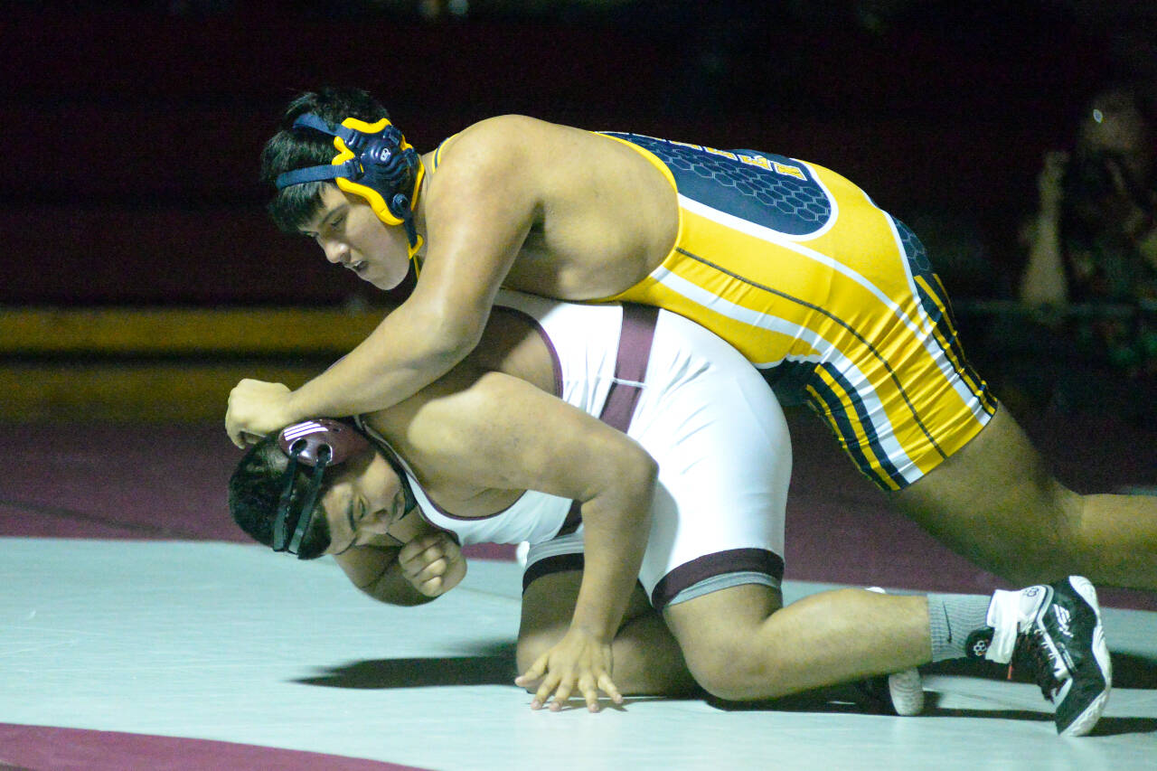 RYAN SPARKS | THE DAILY WORLD Aberdeen’s Paul Baltazar, top, grapples with Montesano’s Jesse Cervantes during a dual meet on Wednesday in Montesano.