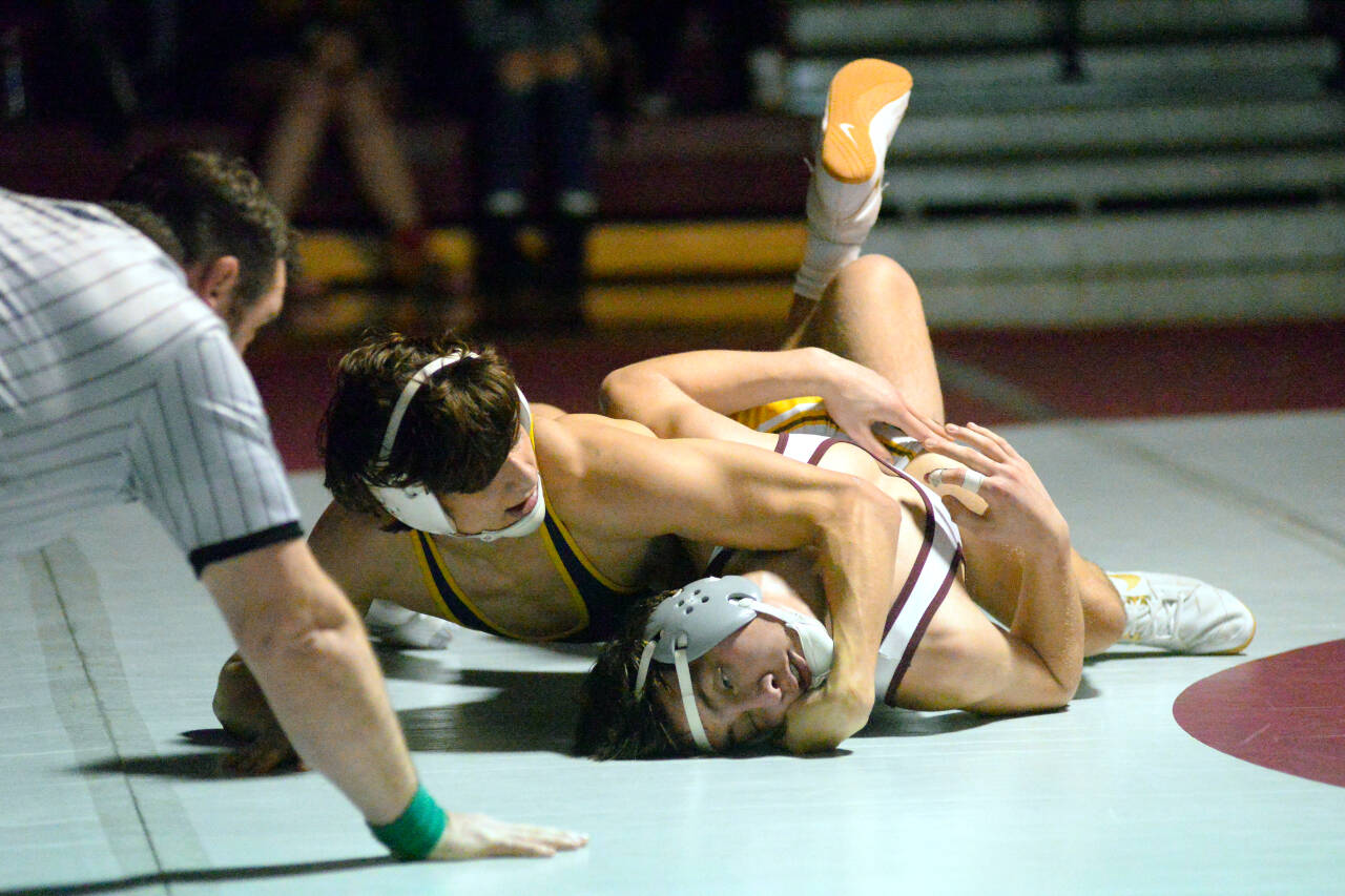 RYAN SPARKS | THE DAILY WORLD Aberdeen’s Aiden Watkins, top looks to pin Montesano’s Gage Stutesman during a dual meet on Wednesday at Bo Griffith Memorial Gymnasium in Montesano.