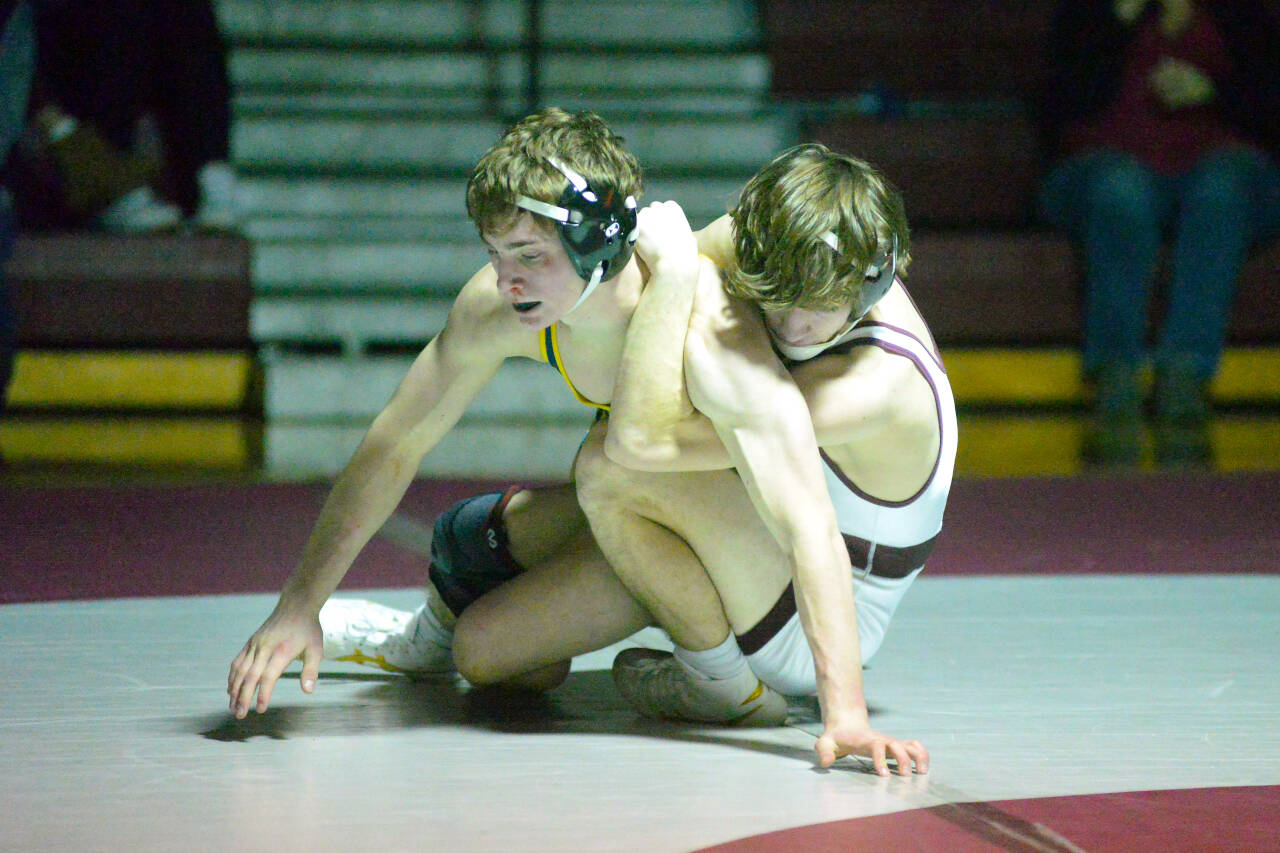 RYAN SPARKS | THE DAILY WORLD Montesano’s Cole Ekerson, right, controls Aberdeen’s Michael Leontyev during a dual meet on Wednesday in Montesano.