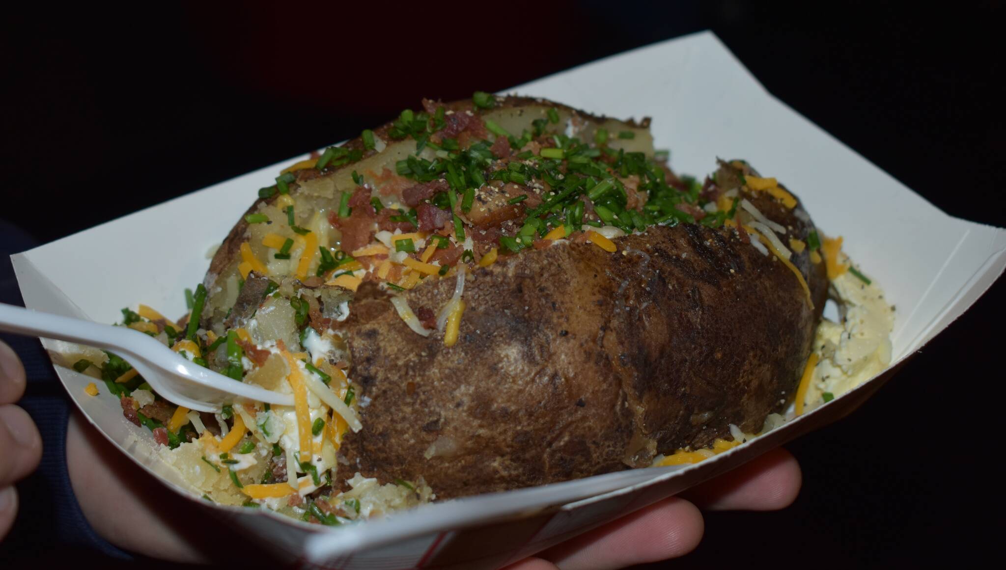 Hundreds of freshly baked potatoes with all the fixings were available to all guests for $5 during the Baked Potato Feed and Dollar Auction fundraiser for the Grays Harbor Timberwolves on Saturday, Jan. 21, in Aberdeen. (Allen Leister / The Daily World)