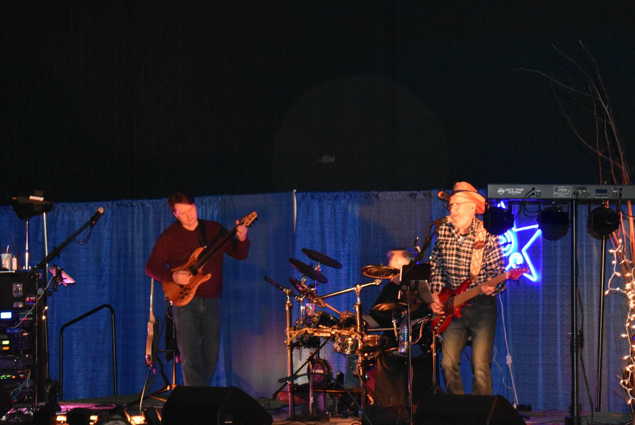 Allen Leister / The Daily World 
Live music performances from Backfire Band (pictured), Jokers Wild, and The Olson Brothers drew large crowds within the Mike Murphy Pavilion during the 14th annual Elma Winter Wine Festival on Saturday, Jan. 21.