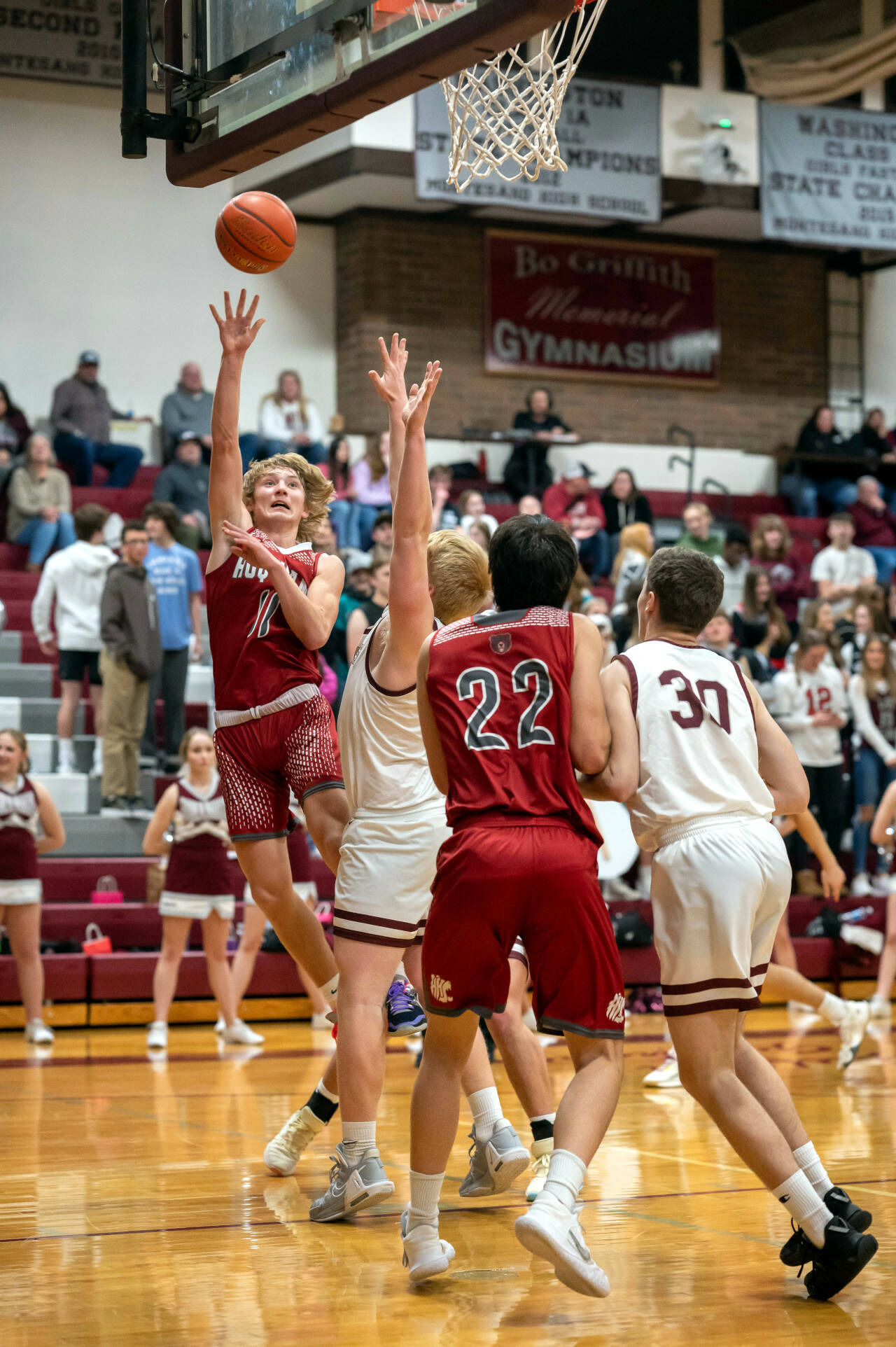 PHOTO BY FOREST WORGUM Hoquiam’s Zander Jumps, left, shoots during the Grizzlies’ 54-28 win over Montesano on Thursday in Montesano.