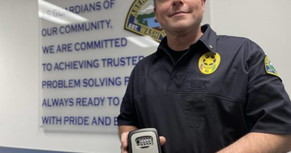 Michael S. Lockett / The Daily World
Cmdr. Steve Timmons of the Aberdeen Police Department holds a lockbox of the type that will be available for residents of Aberdeen at no cost through a new program to assist entry for emergency responders in the case of a medical emergency.