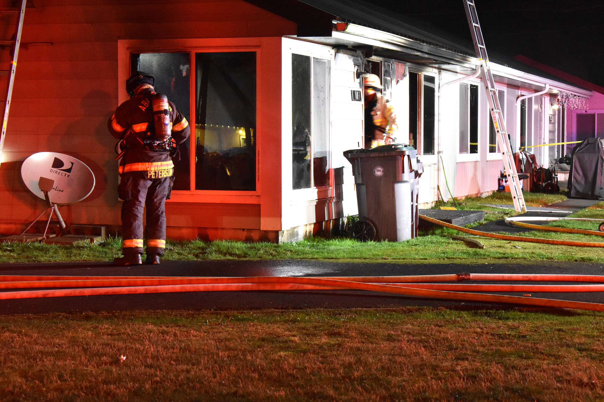 Hoquiam and Aberdeen firefighters were able to rapidly knock down a structure fire at Hoquiam residence on Saturday night, Feb. 11. (Matthew N. Wells / The Daily World)