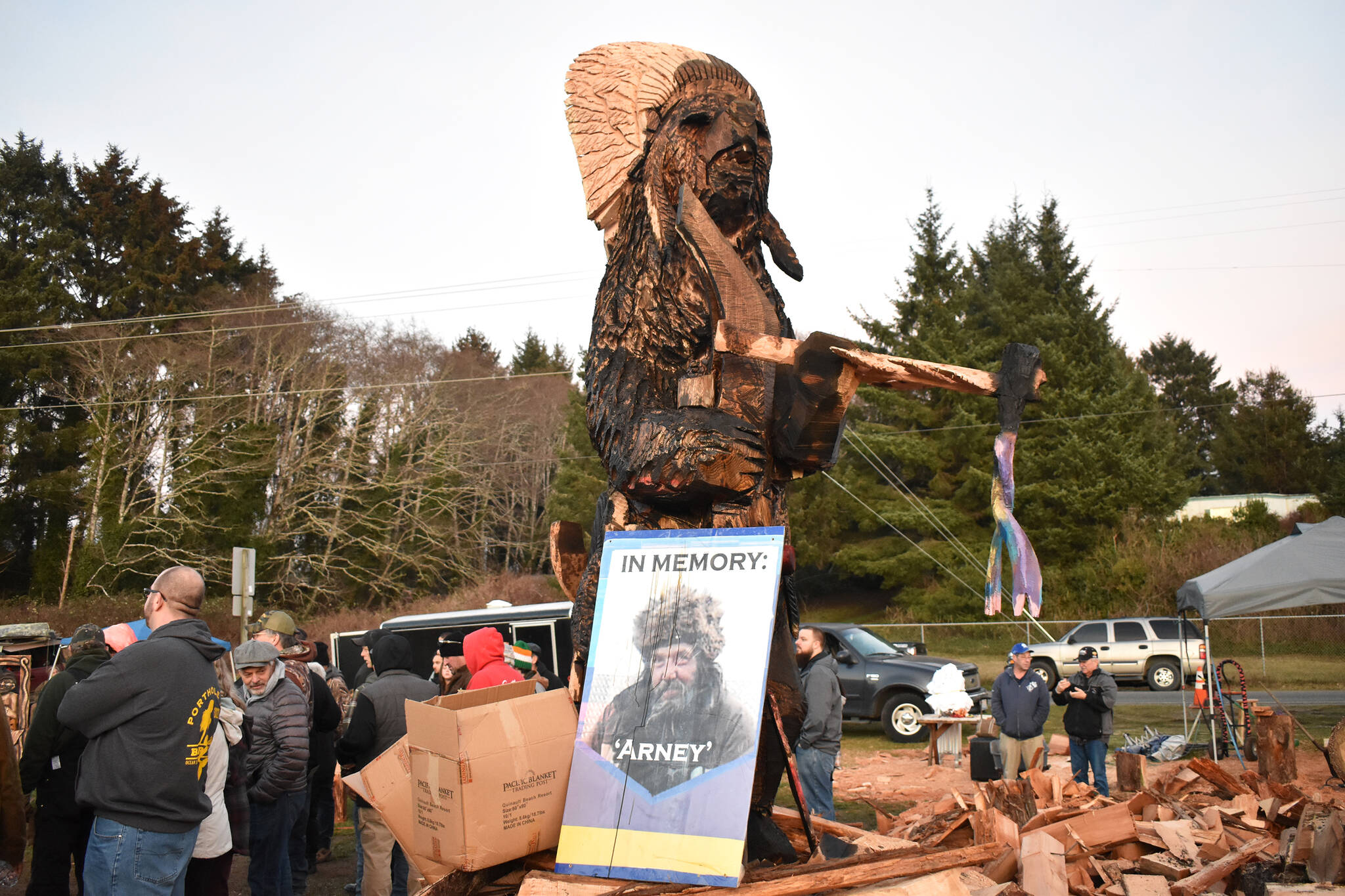 (Clayton Franke / The Daily World) A group of carvers worked together to carve the bear leading up to Saturday's festival. The bear was a tribute to several local carvers who recently passed away.