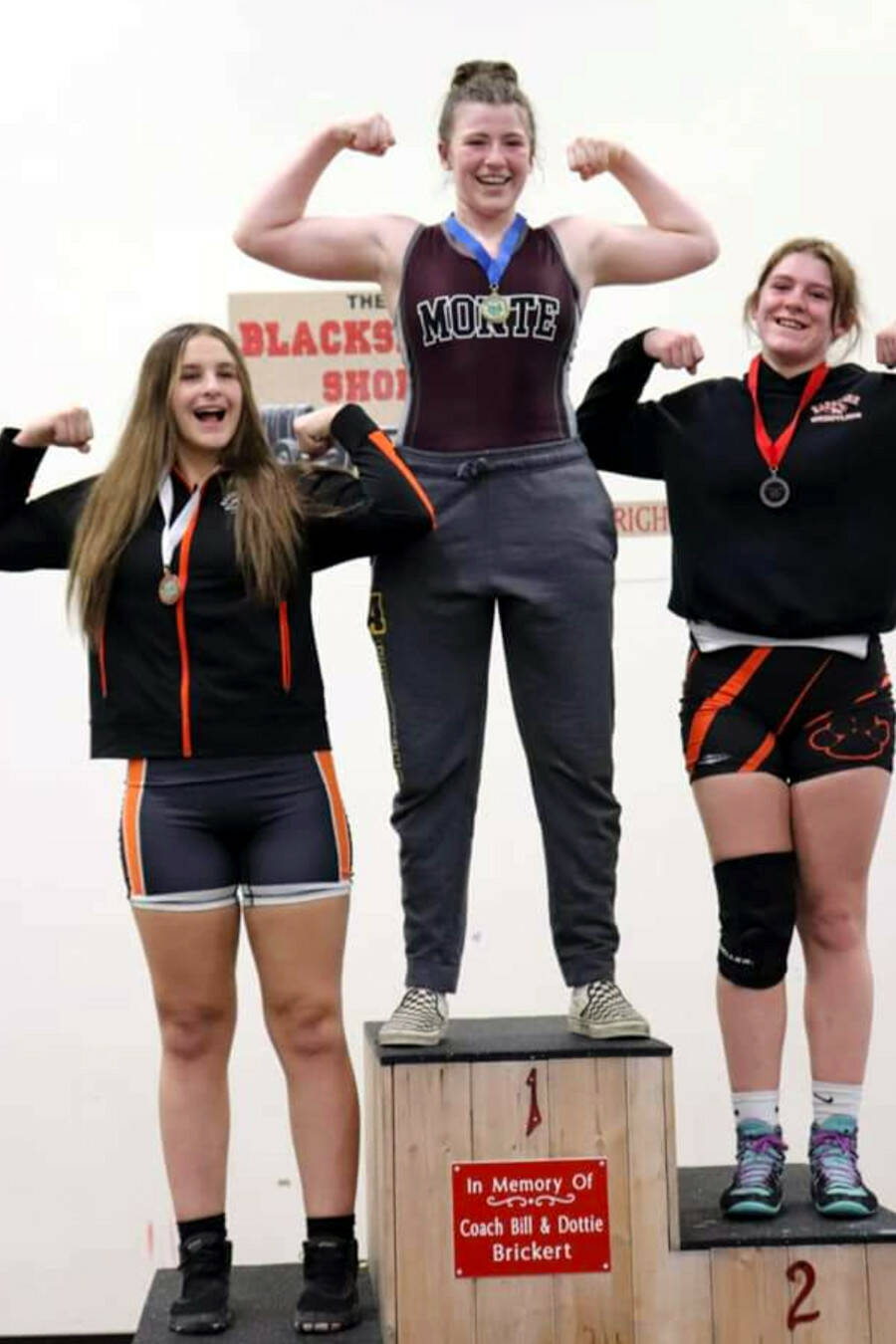 SUBMITTED PHOTO Montesano’s Kya Roundtree (1) stands atop the podium after winning the 170-pound weight class at the 1B/2B/1A/2A Region 2 Championships on Saturday in Shelton.
