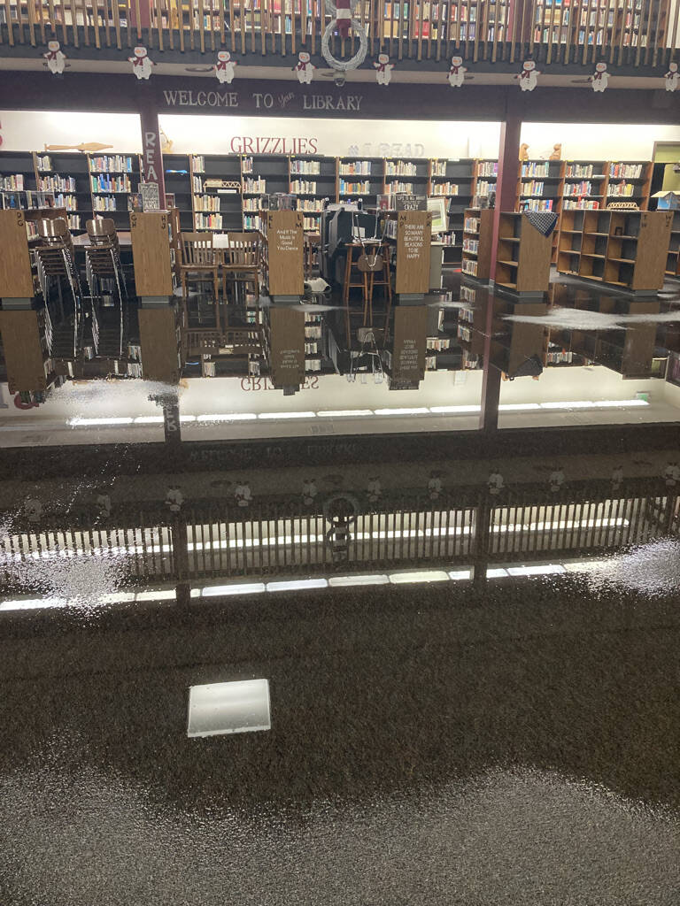(Courtesy of Mike Villarreal) During a late-December cold snap, an HVAC unit broke in the Hoquiam High School building, flooding the library floor with an inch of water.