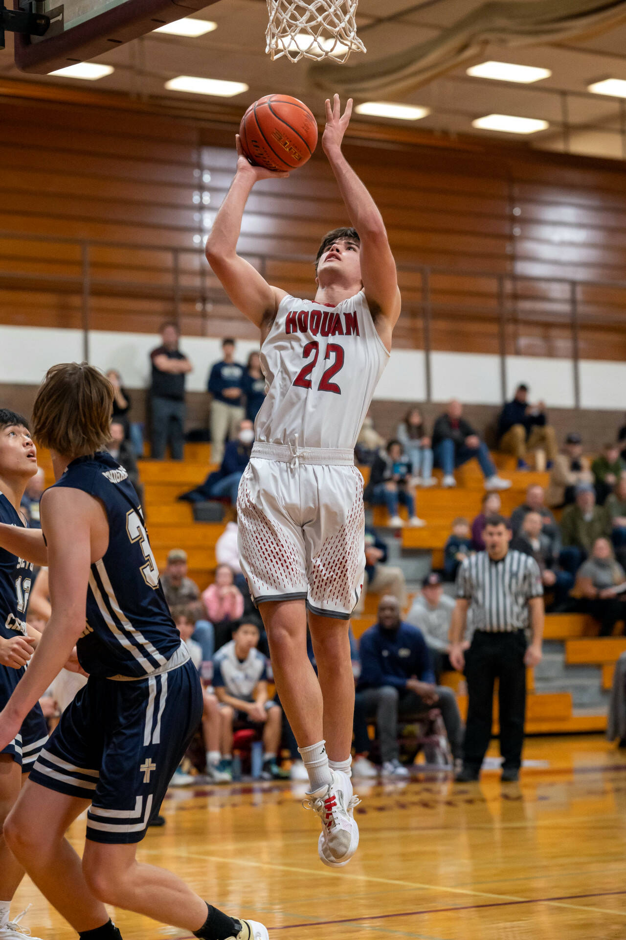 PHOTO BY FOREST WORGUM Hoquiam’s Aiden Butcher scores on a layup in a 63-45 season-ending loss to Seton Catholic in a 1A District 4 Tournament elimination game on Thursday in Montesano.