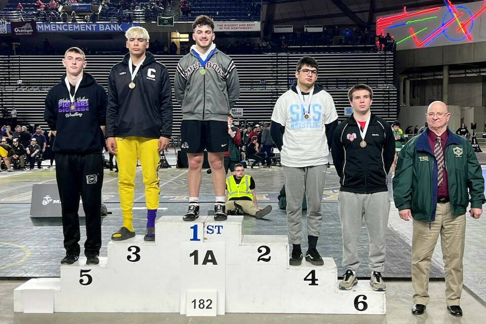 SUBMITTED PHOTO 
Montesano’s Mateo Sanchez stands atop the podium after winning the 182-pound championship at the WIAA Mat Classic XXXIV tournament on Saturday at the Tacoma Dome.