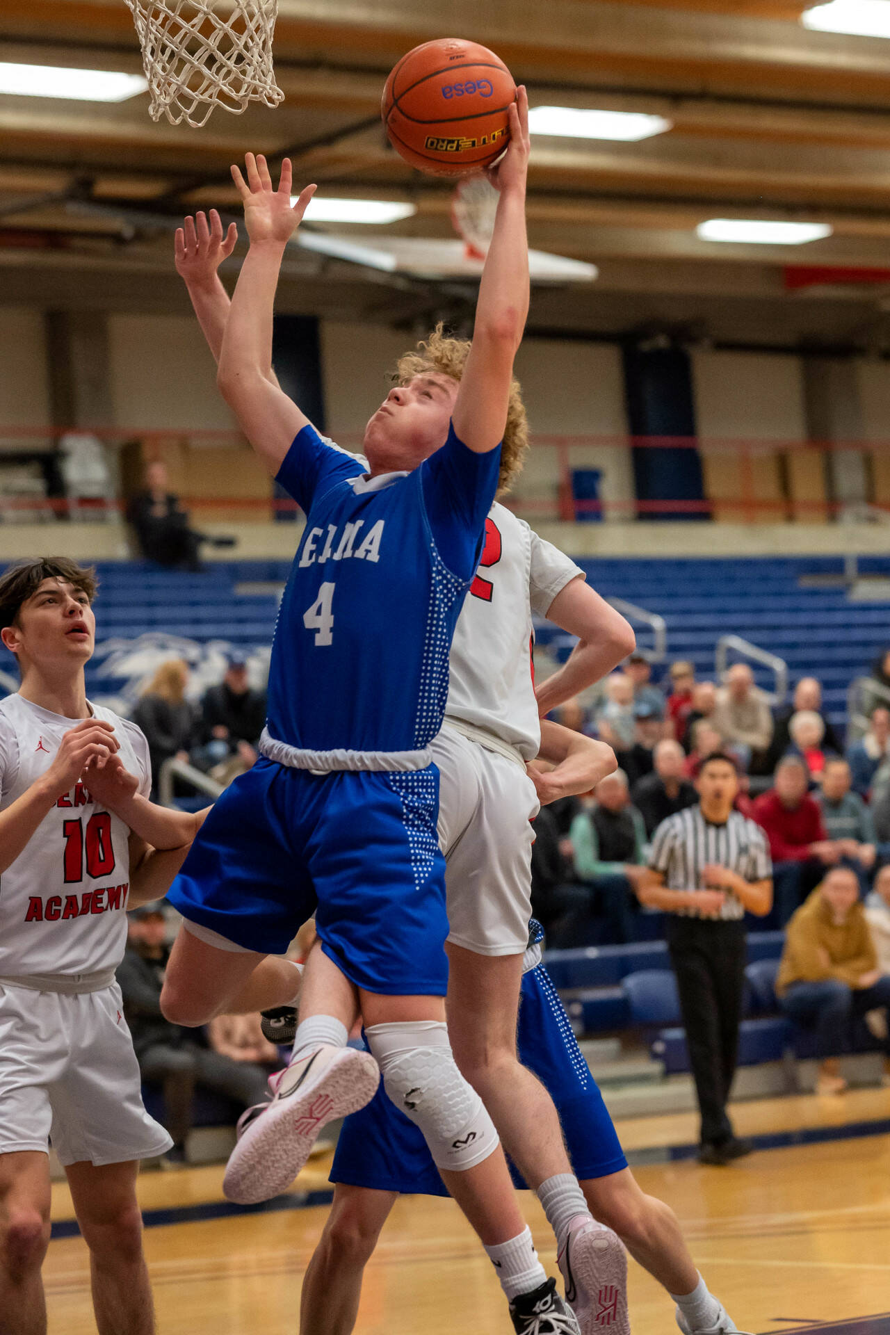 PHOTO BY FOREST WORGUM Elma’s Grant Vessey drives to the basket during the Eagles’ 71-56 loss to Seattle Academy in a 1A State playoff game on Saturday at W.F. West High School in Chehalis.