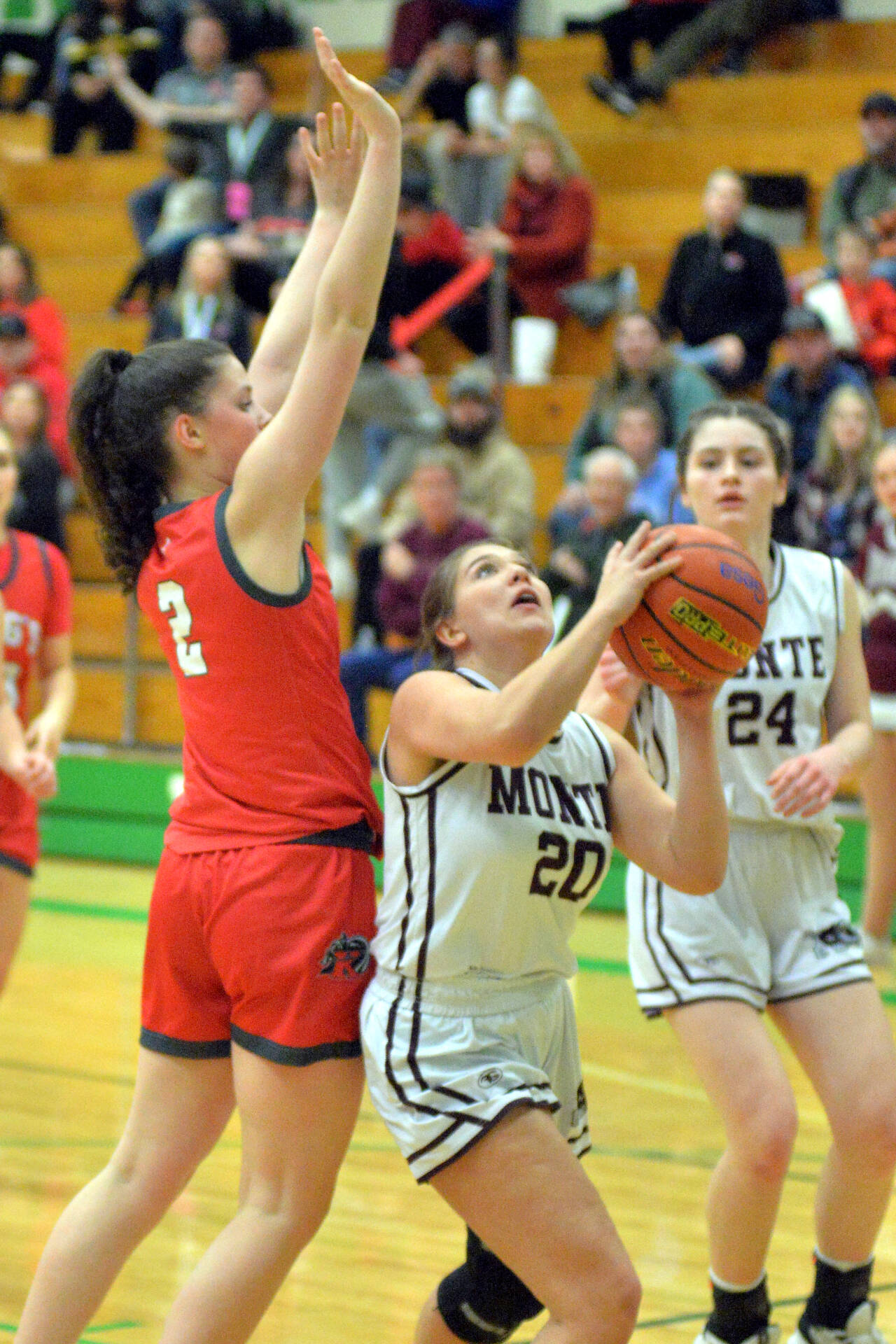 RYAN SPARKS | THE DAILY WORLD Montesano senior Jordan Karr (20) looks to shoot against King’s forward Kaitlin Cramer during a 51-37 loss in a 1A State Tournament game on Saturday at Tumwater High School.