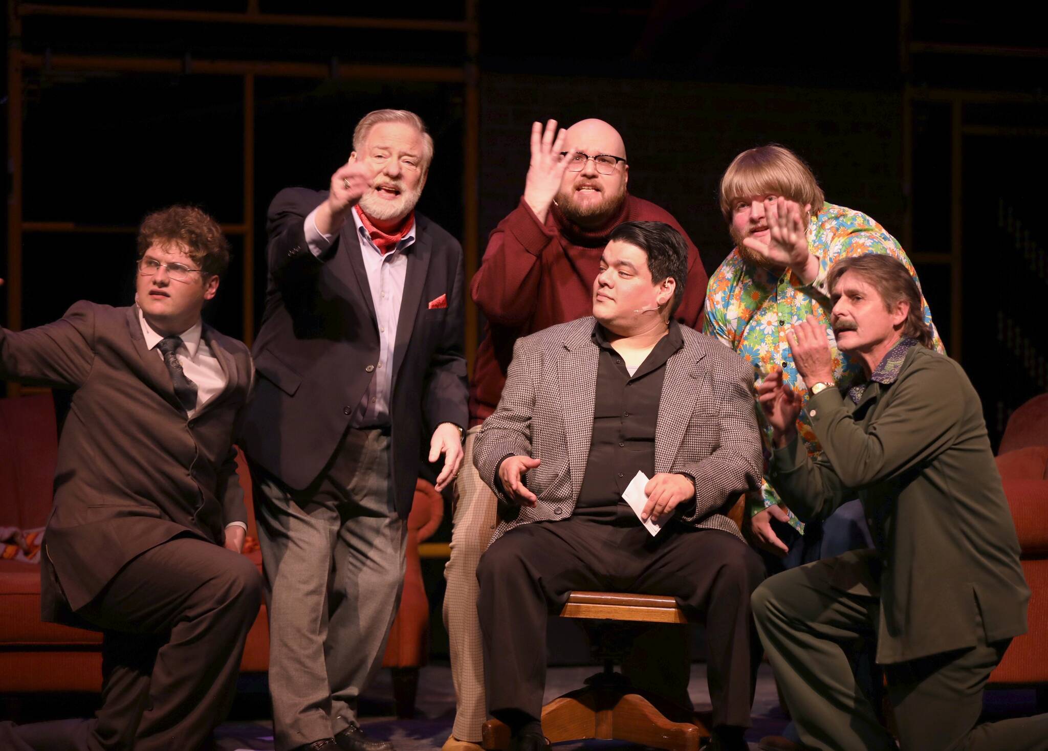 Robert (played by Chris Fruto, in chair) receives unsolicited advice on romance from some of his male friends (played by, from left: Noah Johnson, Stan Sidor, Matthew Kline, Elliot Loudenback and Eric Bjella).