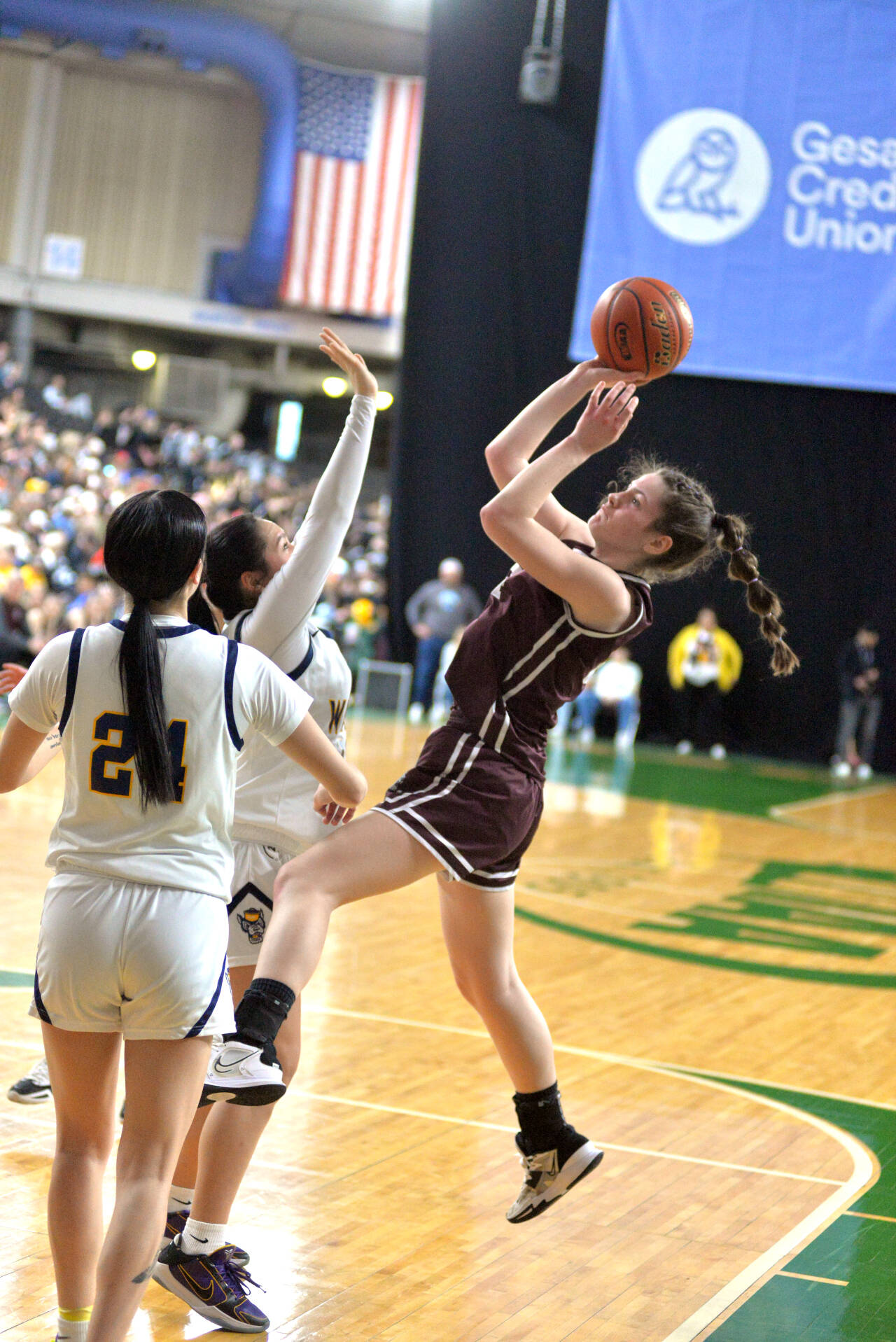 RYAN SPARKS / THE DAILY WORLD 
Montesano freshman Jillie Dalan, right, puts up a shot during the Bulldogs’ 64-36 loss to Wapato in a 1A State quarterfinal game on Thursday at the Yakima Valley SunDome.
