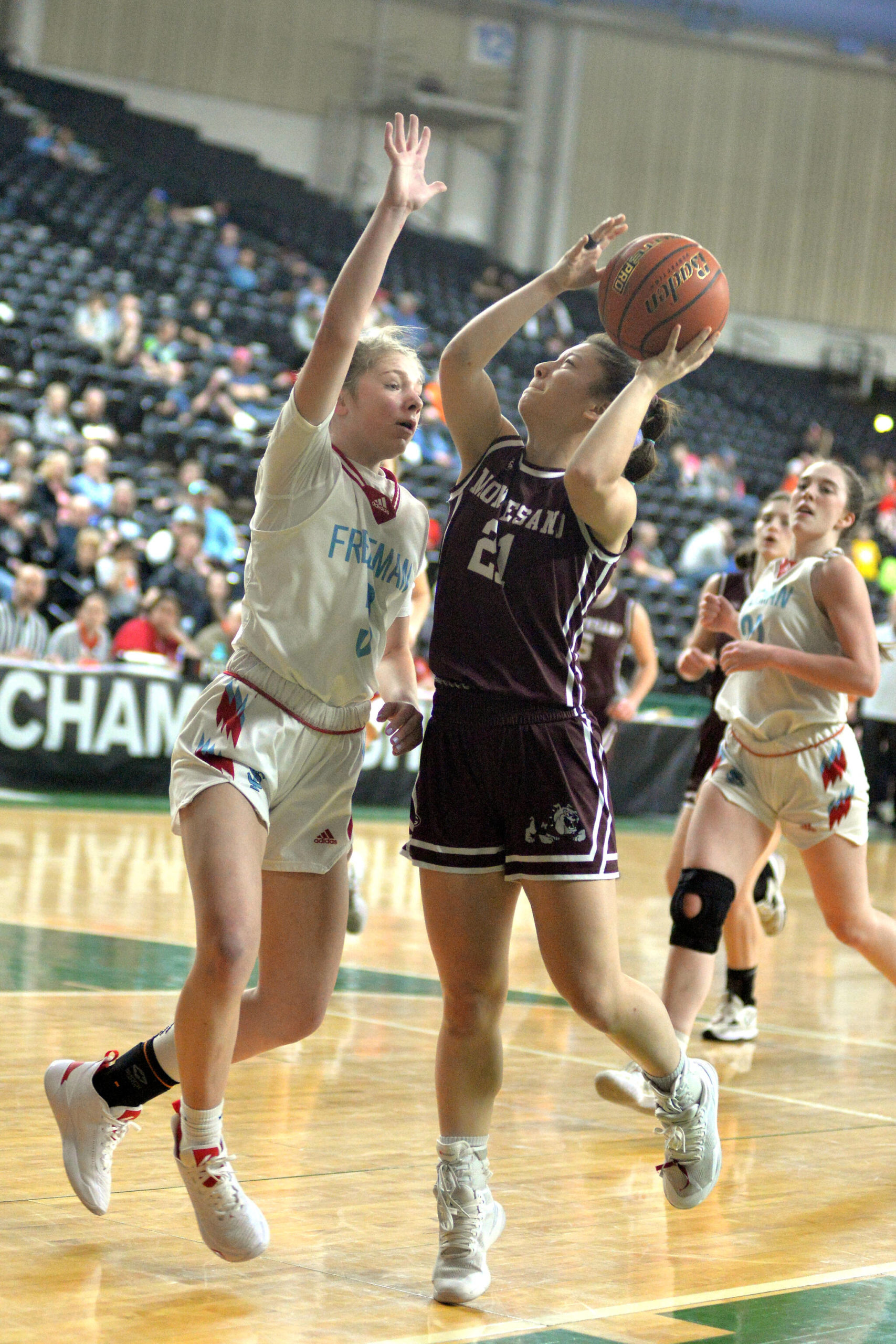 RYAN SPARKS | THE DAILY WORLD Montesano senior Vanna Prom (21) looks to shoot against Freeman’s Natalie Semprimoznik during the Bulldogs’ 49-38 loss in a 1A State consolation-round game on Friday at the Yakima Valley SunDome.