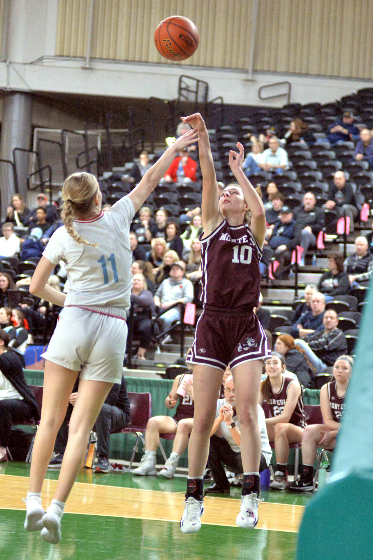 RYAN SPARKS | THE DAILY WORLD Montesano junior Mikayla Stanfield (10) shoots against Freeman’s Taylor Denenny during the Bulldogs’ 49-68 loss in a 49-38 loss in a 1A State consolation-round game on Friday at the Yakima Valley SunDome.