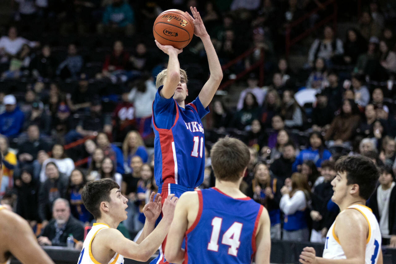 ALEC DIETZ | THE CHRONICLE Willapa Valley guard Riley Pearson takes a shot against Wellpinit in the 1B State semifinals at Spokane Arena on Friday.