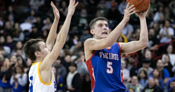 ALEC DIETZ | THE CHRONICLE
Willapa Valley forward Wil Clements rises for a shot against Wellpinit in the 1B State semifinals at Spokane Arena on Friday.