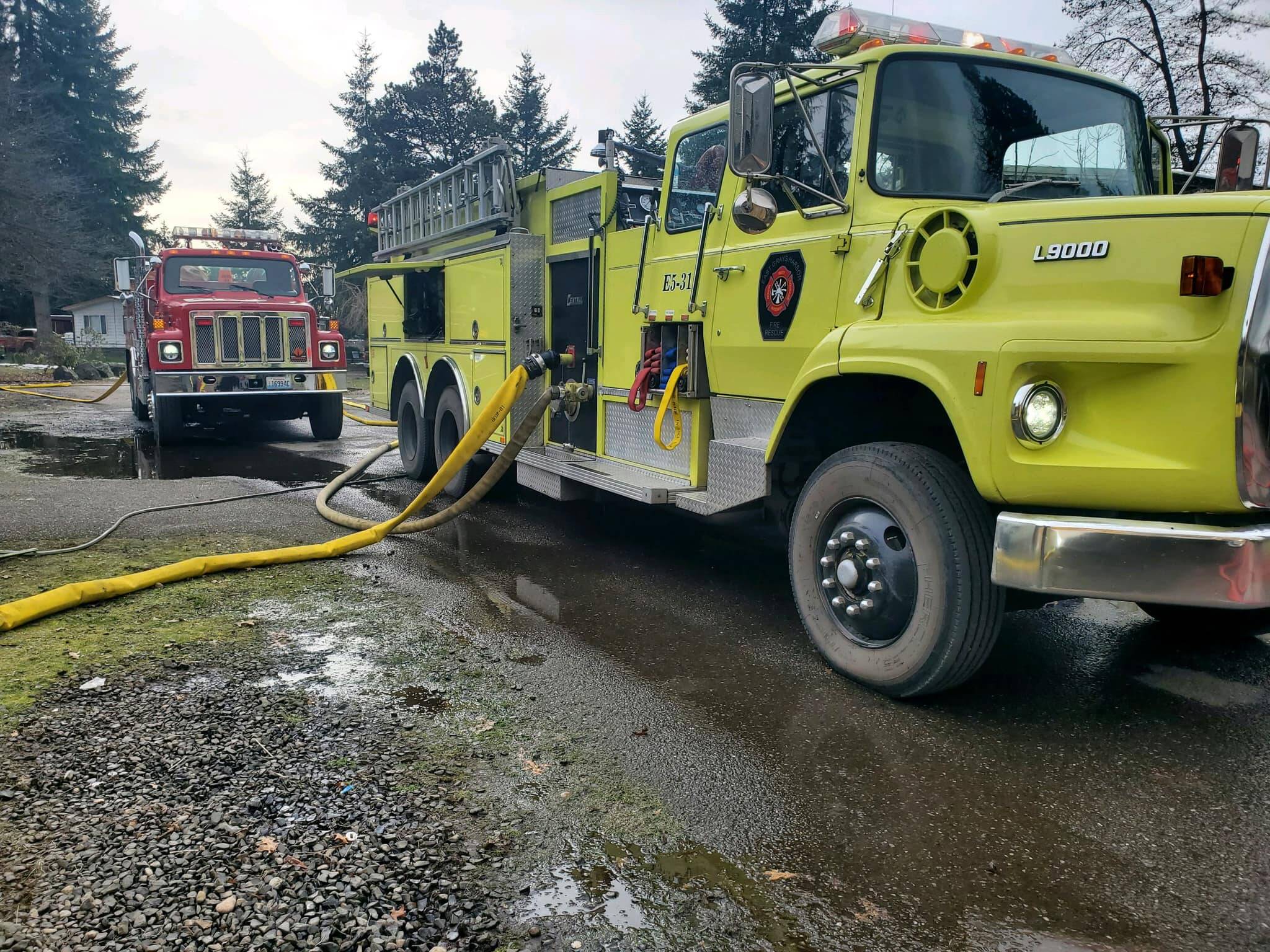 Multiple departments responded to a major fire at a residence that spread to a tree and destroyed a second residence south of Elma on Feb. 25. (Courtesy photo / East Grays Harbor Fire and Rescue)