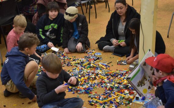 Children from ages six to 11 used their imaginations to build their lego creations alongside their fellow peers and parents during Lego Club at the Montesano Timberland Regional Library on Wednesday, March 8. (Allen Leister / The Daily World)