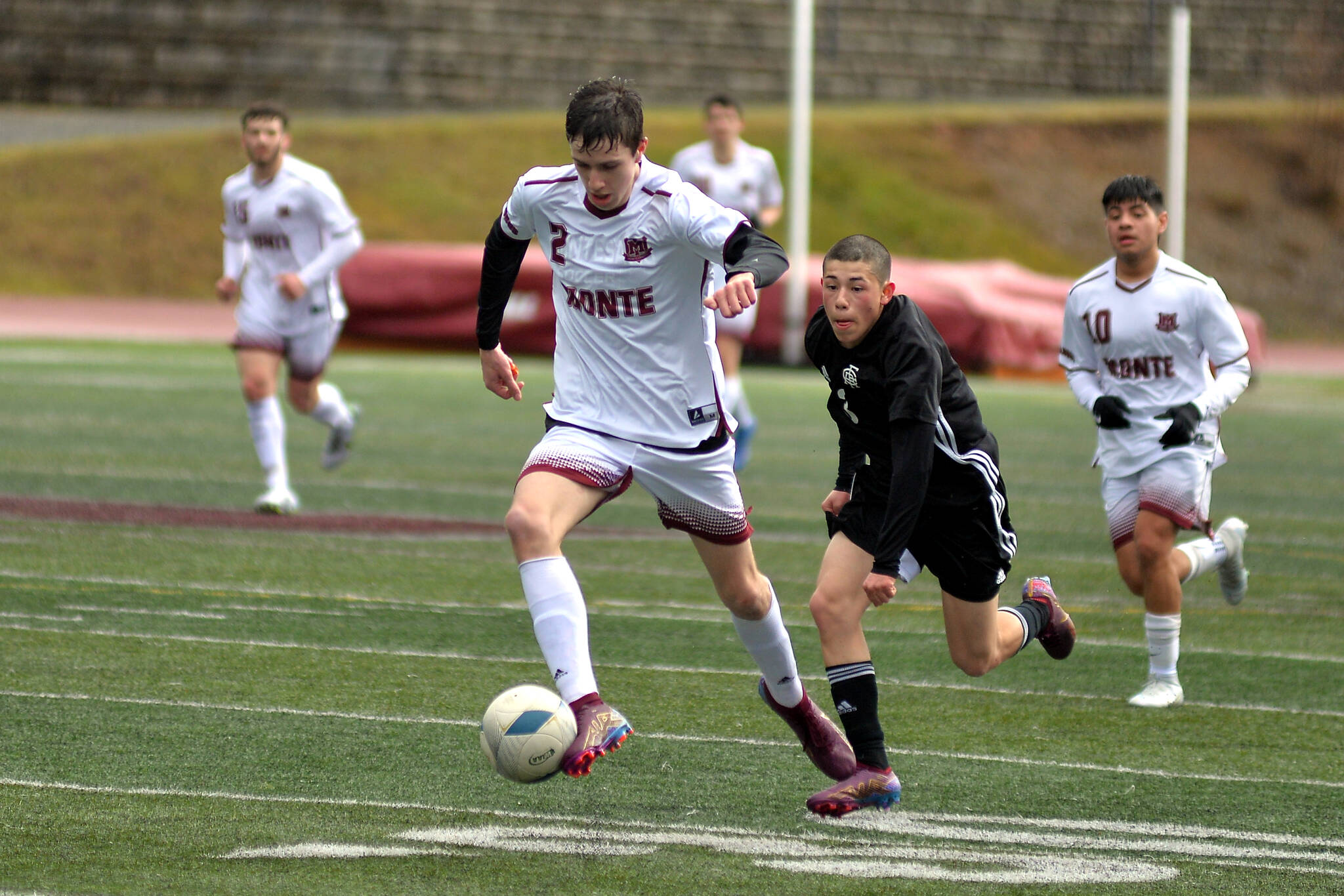 RYAN SPARKS | THE DAILY WORLD Montesano’s Luke Clements (2) gains possession through the midfield during the Bulldogs’ 2-1 win over Royal on Saturday in Montesano.