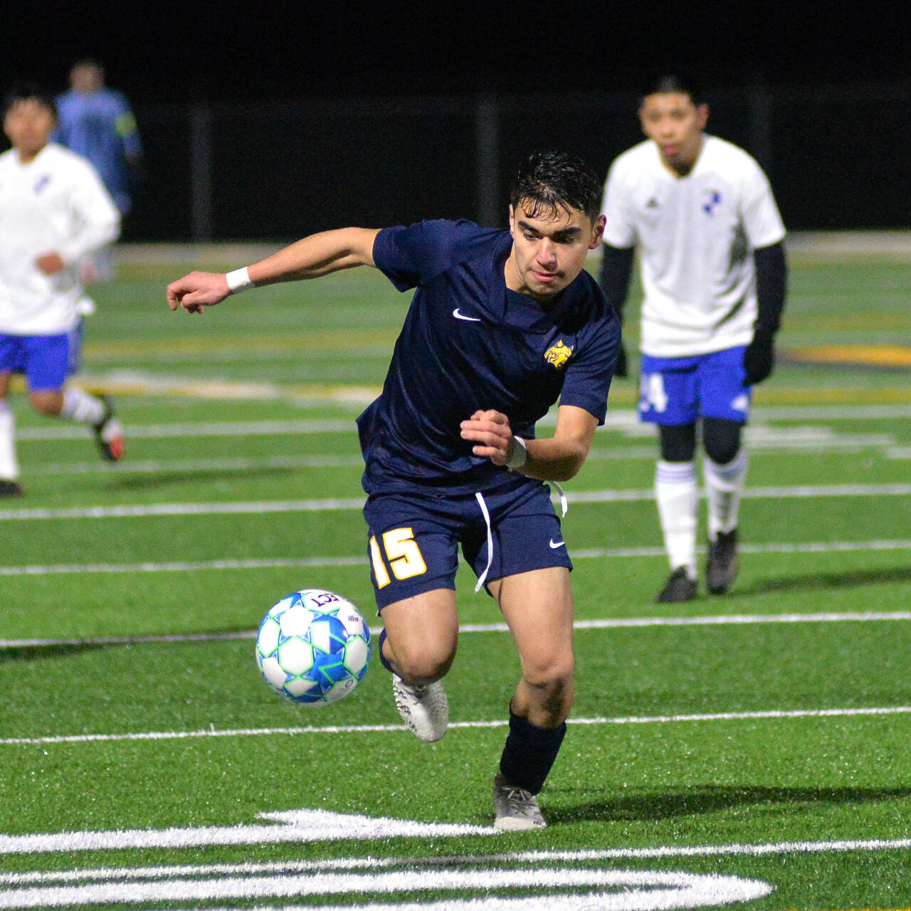 RYAN SPARKS | THE DAILY WORLD Aberdeen forward Carlos Mendoza pushes the ball forward in the second half of the Bobcats’ 3-0 win over Elma on Monday in Aberdeen.