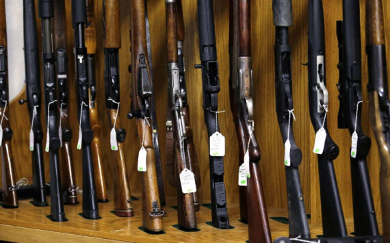 Elaine Thompson / AP
In this Oct. 20, 2017 photo, rifles are lined up and ready to be auctioned at Johnny’s Auction House, where the company handles gun sales for about a half dozen police departments and the Lewis County Sheriff’s Office, in Rochester.