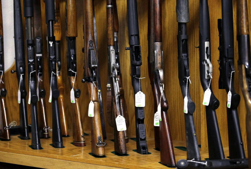 <p>Elaine Thompson / AP</p>
                                <p>In this Oct. 20, 2017 photo, rifles are lined up and ready to be auctioned at Johnny’s Auction House, where the company handles gun sales for about a half dozen police departments and the Lewis County Sheriff’s Office, in Rochester.</p>