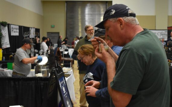 Allen Leister / The Daily World 
Hundreds of people crowded into the main venue of the Ocean Shores Convention Center to taste and vote on the best clam chowder during the 15th annual Razor Clam and Seafood Festival on Friday, March 17 through Sunday, March 19. Participants judged chowder from seven different dining establishments local to Ocean Shores.