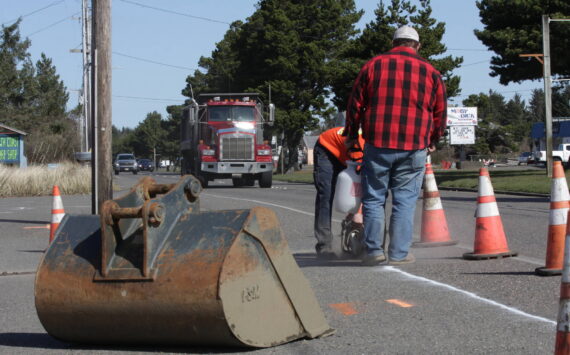 Clayton Franke / The Daily World
Crews from Rognlin’s Inc. cut pavement Monday, March 27 on a crosswalk that will traverse Point Brown Avenue in Ocean Shores. Construction will end May 11 and resume for three days in early July, city officials said.