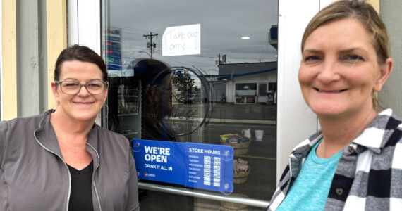 Photos by Matthew N. Wells / The Daily World
Shelly Dixon, left, and Diane Johnson stand outside the front door to their new business, Two Broke Chics — 2605 Simpson Ave., in Hoquiam. The deli’s co-owners talked about opening a sandwich shop for months and the good news for deli-starved Harborites is they can now get their sandwich fix from two experienced artisans.