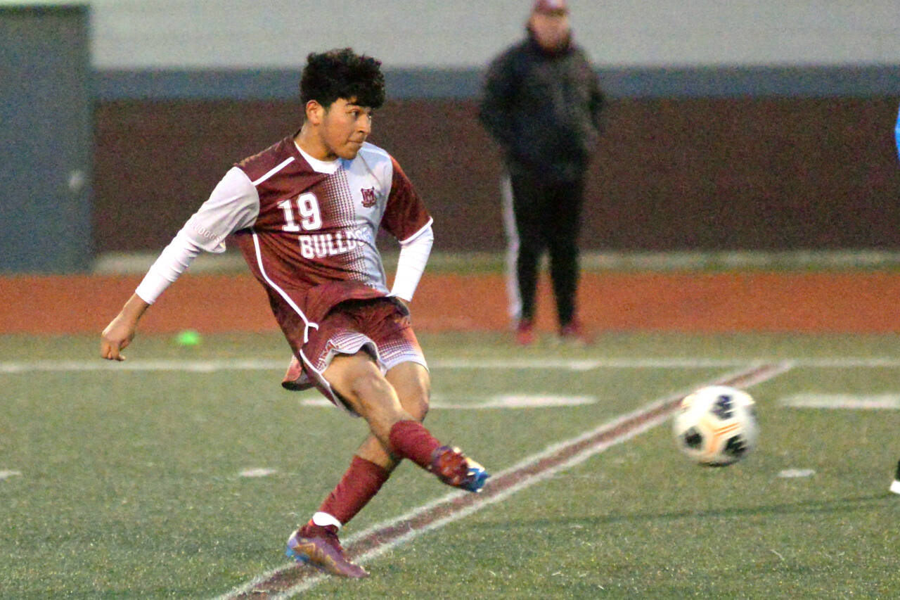 RYAN SPARKS | THE DAILY WORLD Montesano’s Cristofer Tobar scores on a free kick during the Bulldogs’ 5-0 win over Raymond-South Bend on Wednesday in Montesano.
