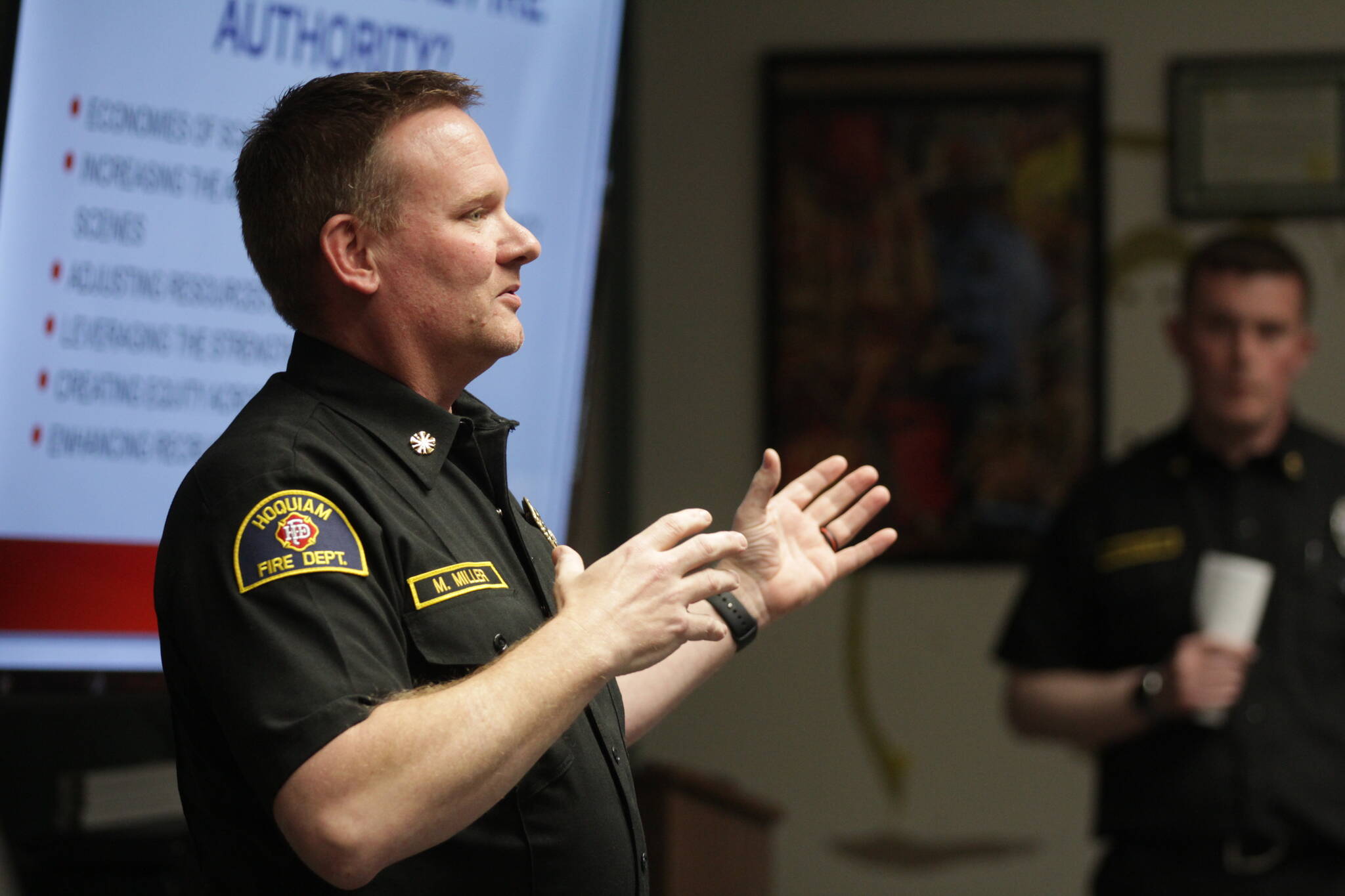 Hoquiam Fire Chief Matt Miller speaks to members of the public during a meeting about the proposed creation of a regional fire authority for Central Grays Harbor on March 28. (Michael S. Lockett / The Daily World)