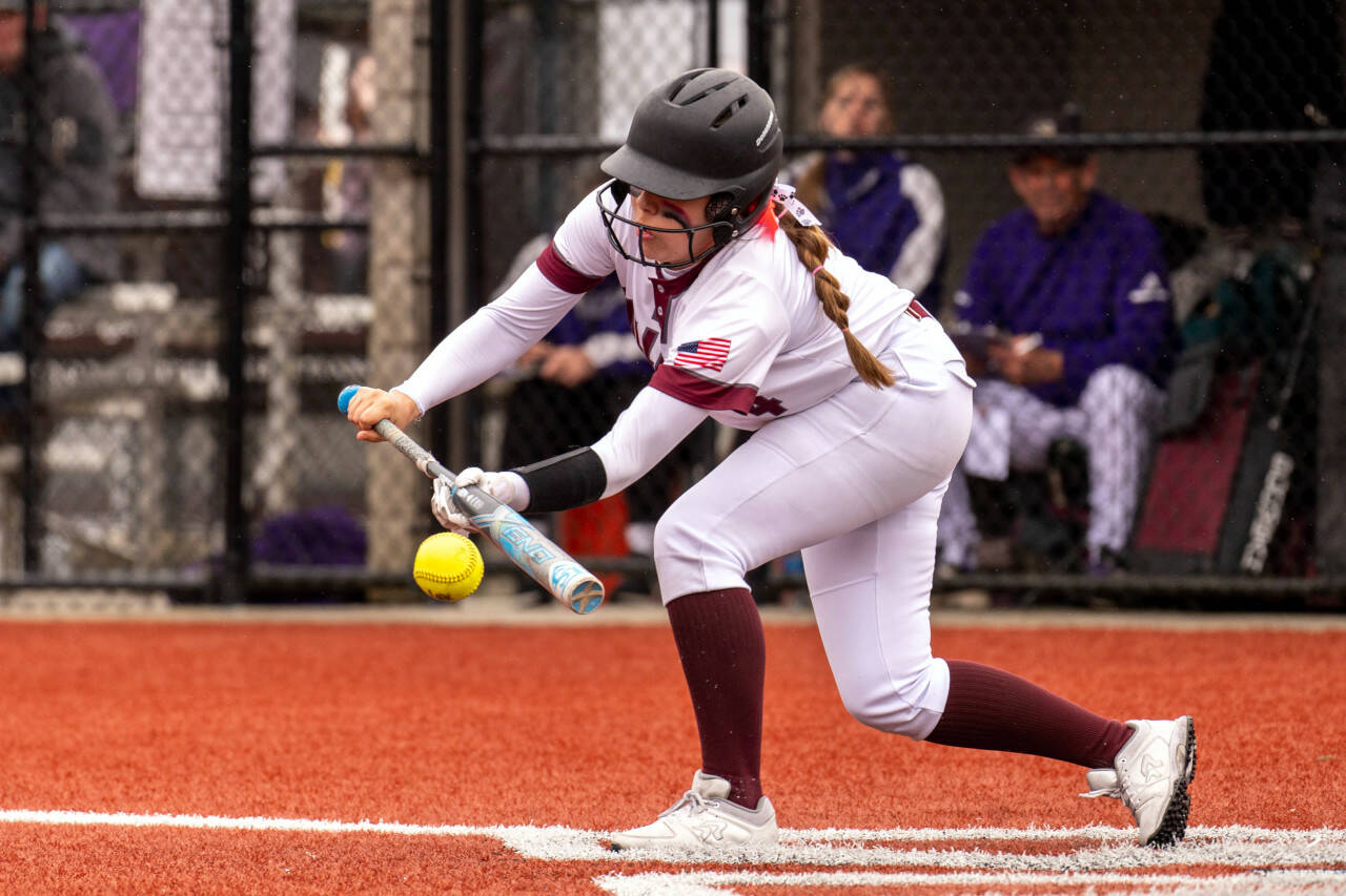 PHOTO BY FOREST WORGUM Montesano’s Jordan Karr lays down a bunt during the Bulldogs’ 19-3 win over Nooksack Valley on Saturday in Montesano.