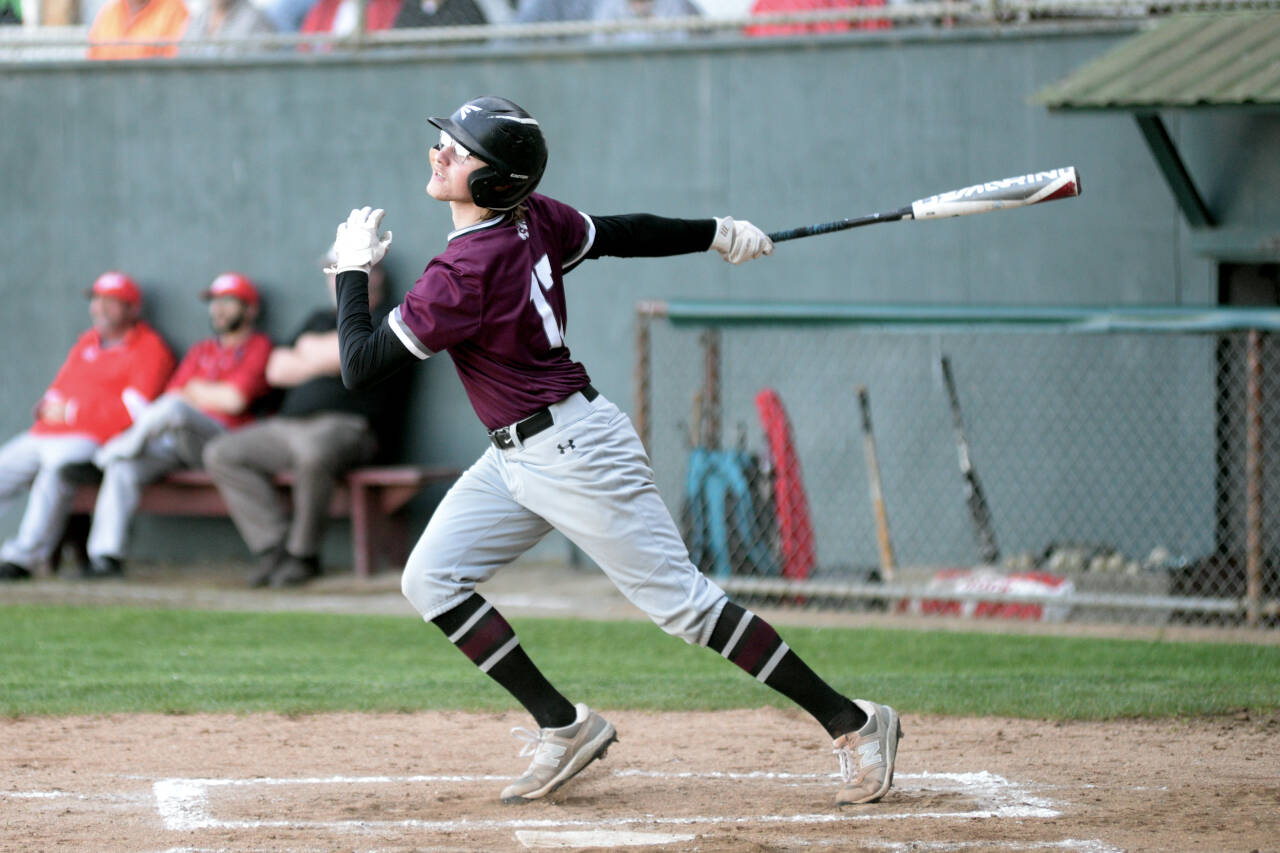 RYAN SPARKS / THE DAILY WORLD 
Montesano’s John Kling belts a double to left field during a 7-4 win over Castle Rock in a 1A District 4 first-round game on Monday in Hoquiam. Kling led Monte with three hits and was the winning pitcher.
