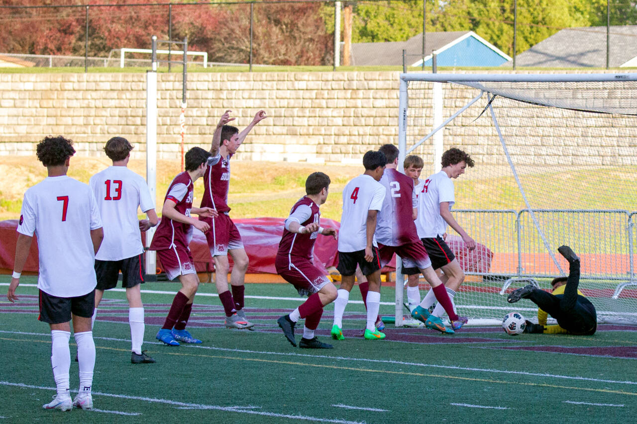 PHOTO BY SHAWN DONNELLY 
Montesano’s Levi Clements, arms raised, scores a goal in the 68th minute to give the Bulldogs a 2-1 win over Columbia-White Salmon in a 1A District 4 semifinal game on Tuesday in Montesano.