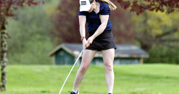 ALEC DIETZ | THE CHRONICLE Aberdeen’s Britt Rajcich tees off at the 2A Evergreen Conference Championships on Tuesday at Tumwater Valley Golf Course in Tumwater. Rajcich would go on to place first and lead Aberdeen to the league championship.