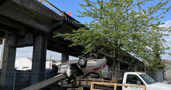 Michael S. Lockett / The Daily World
A wrong-way driver landed in a construction company’s property after swerving off the Chehalis River Bridge on Friday, May 12.